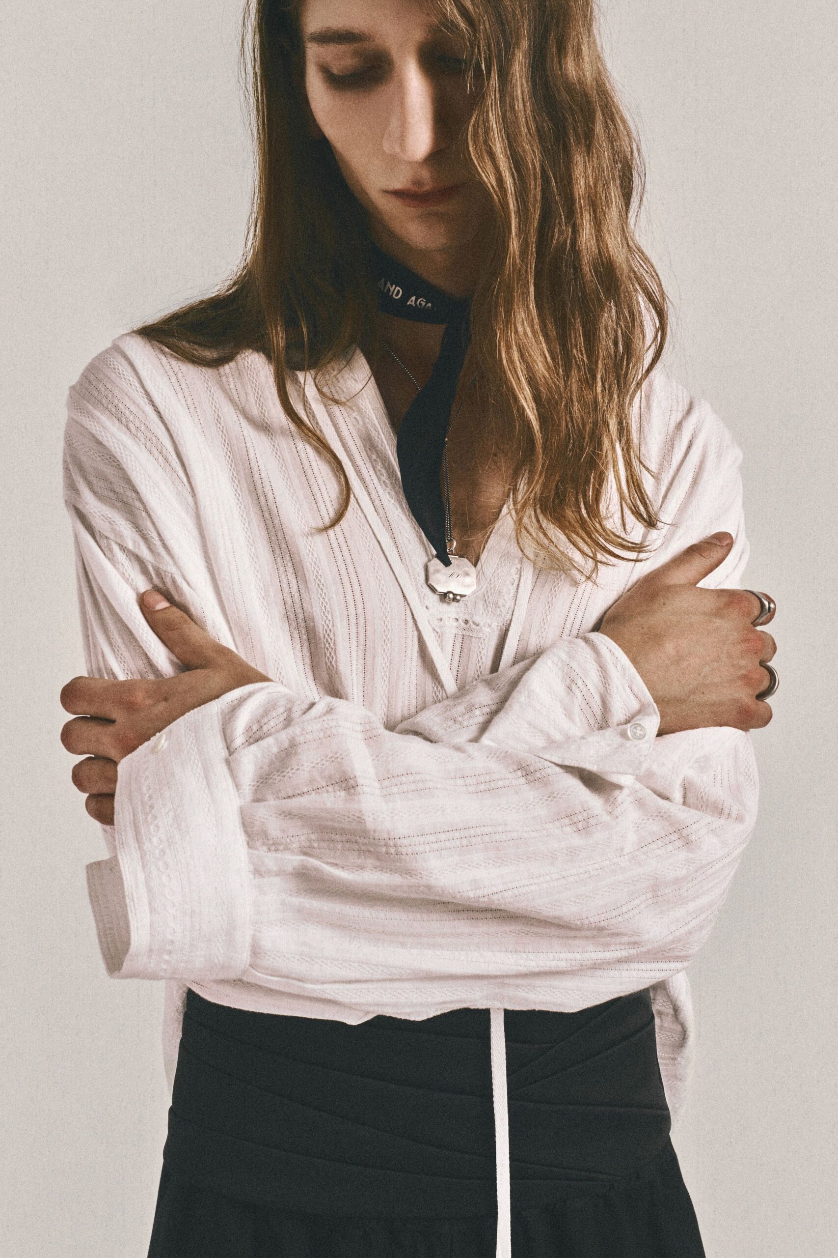white cotton long-sleeve collared relaxed buttoned shirt