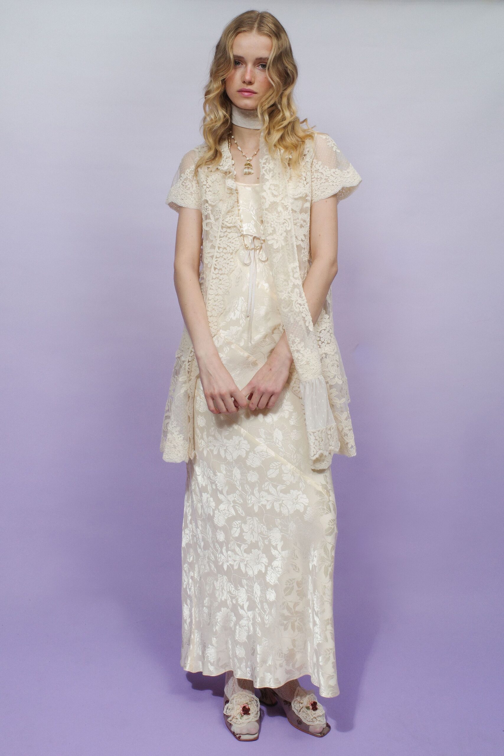 ivory silk sleeveless v-neck fitted floral sheer gown