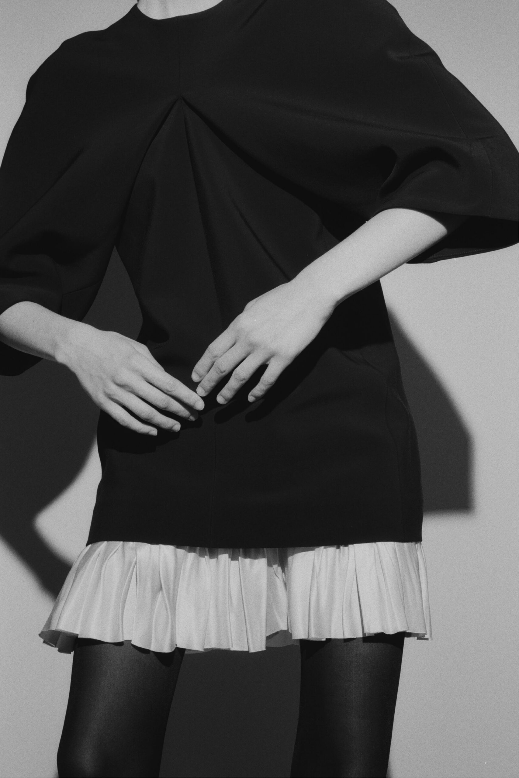 black and white pleated mini dress