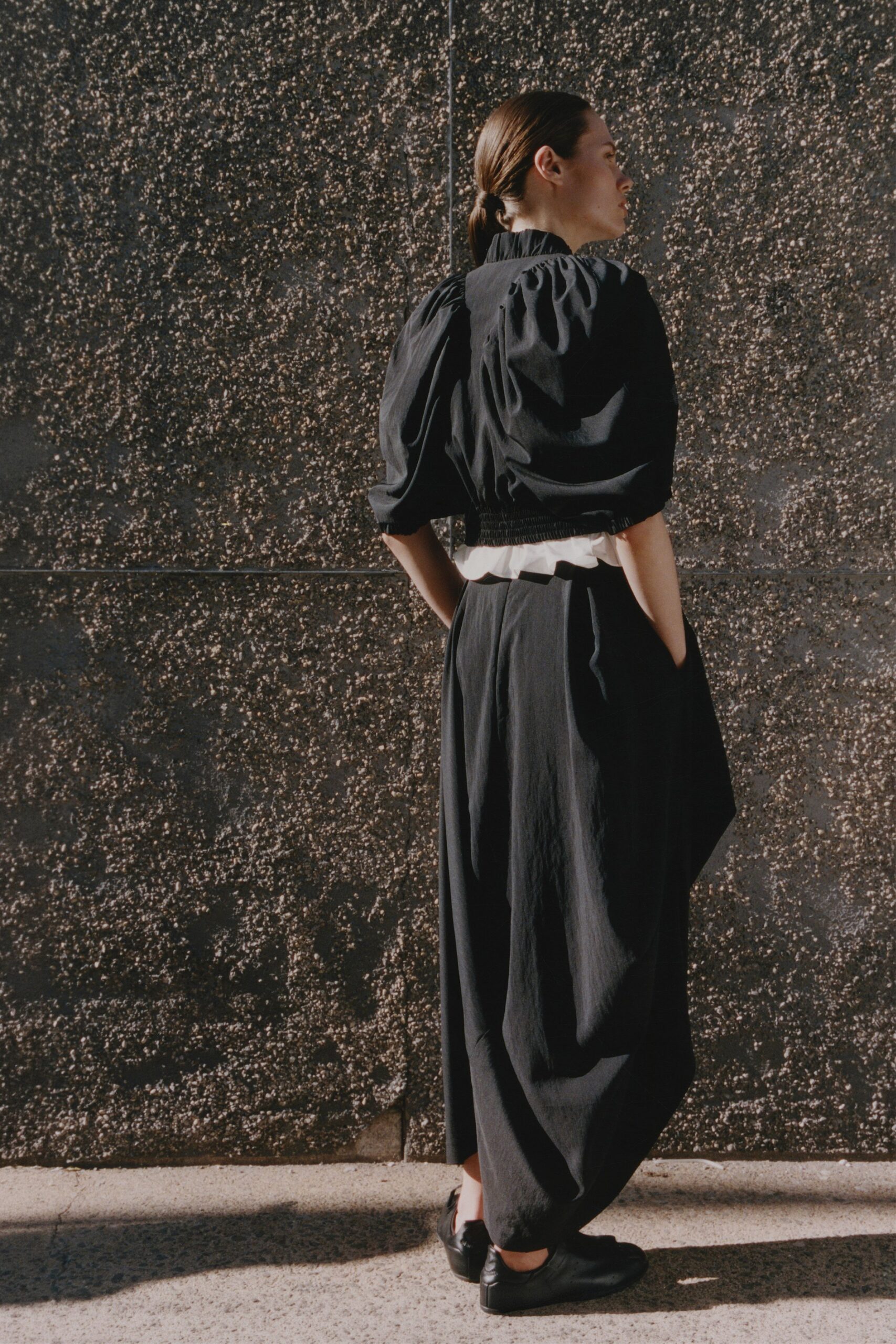 black cotton long-sleeve collared relaxed pleated belted dress