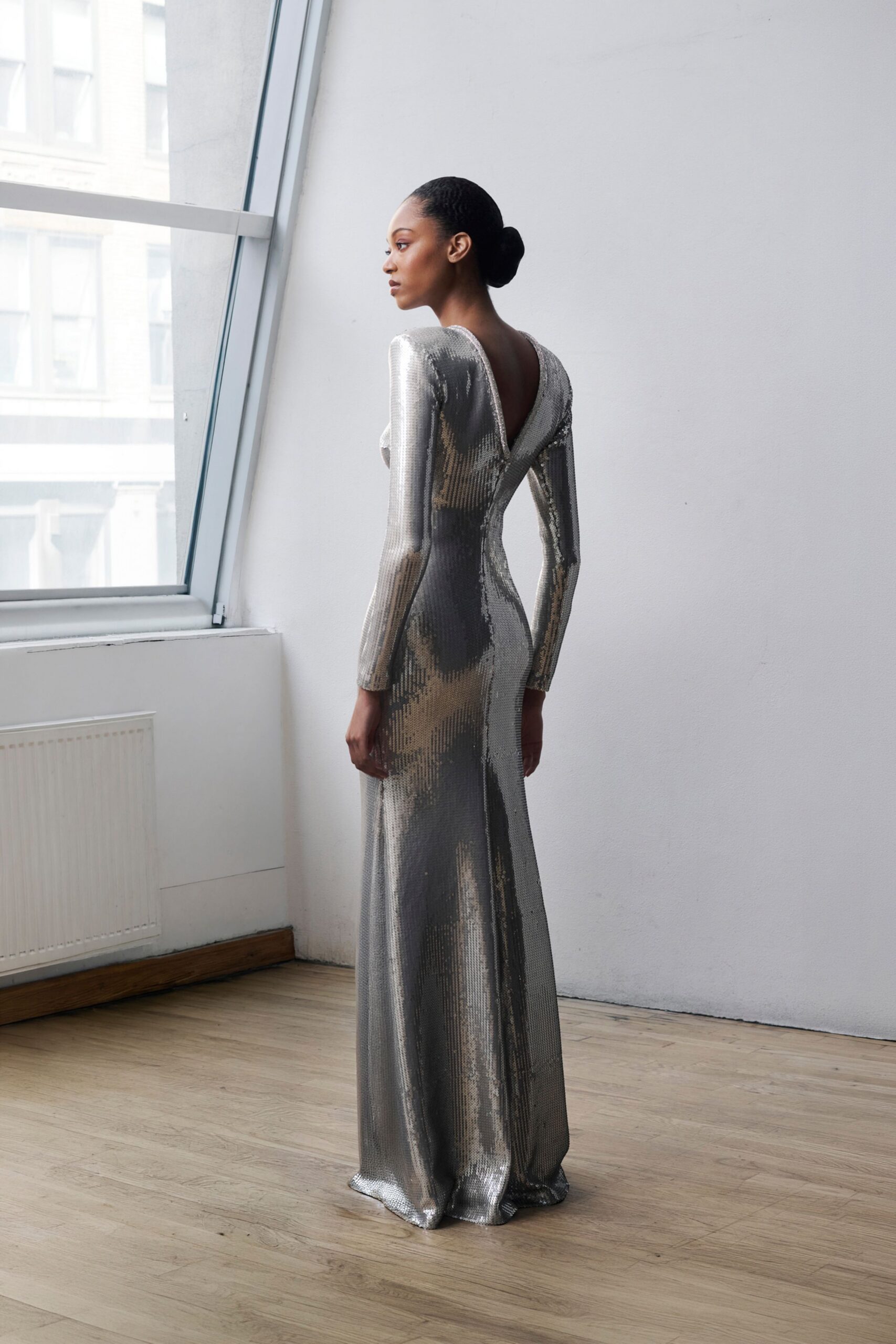 fitted silver sequined gown