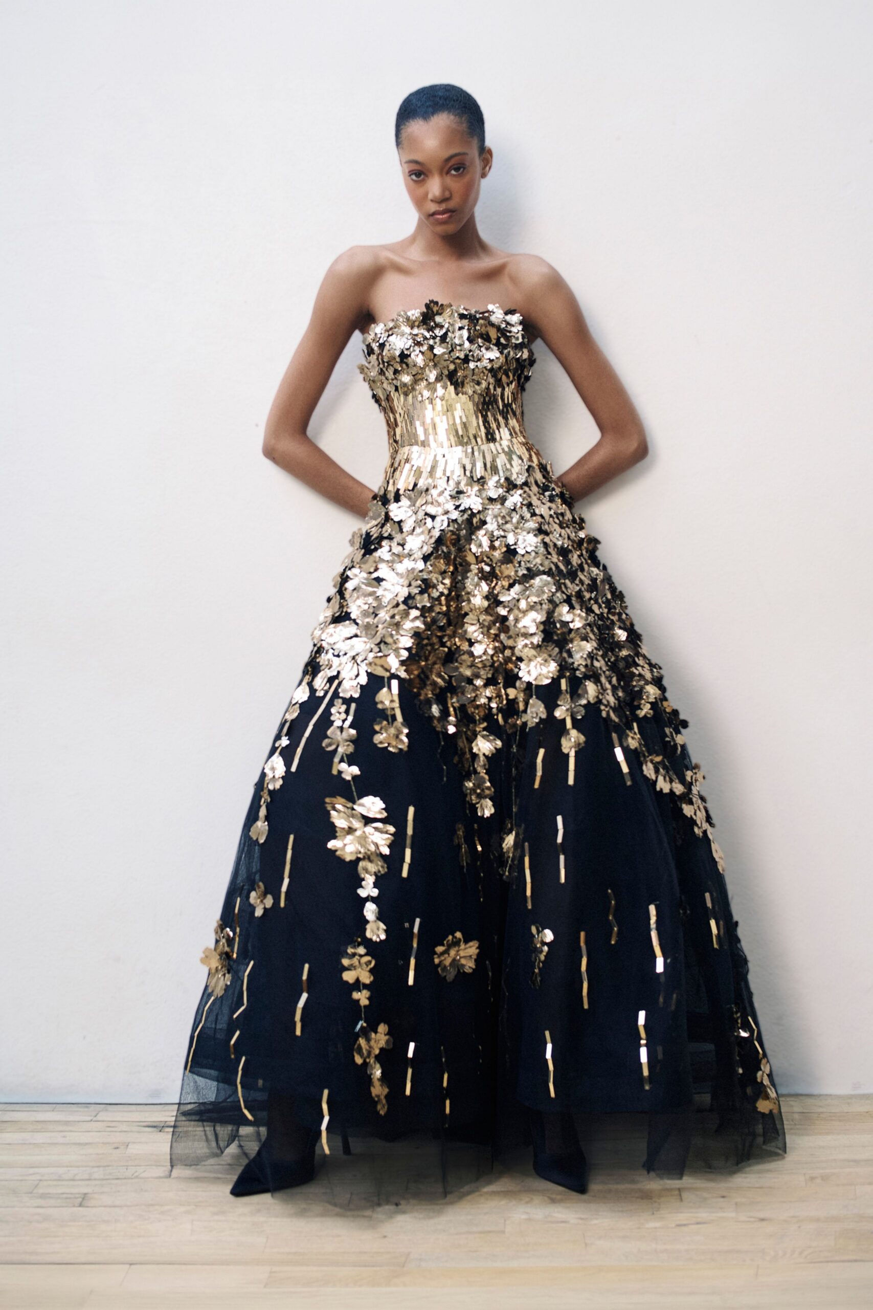 black and gold strapless gown