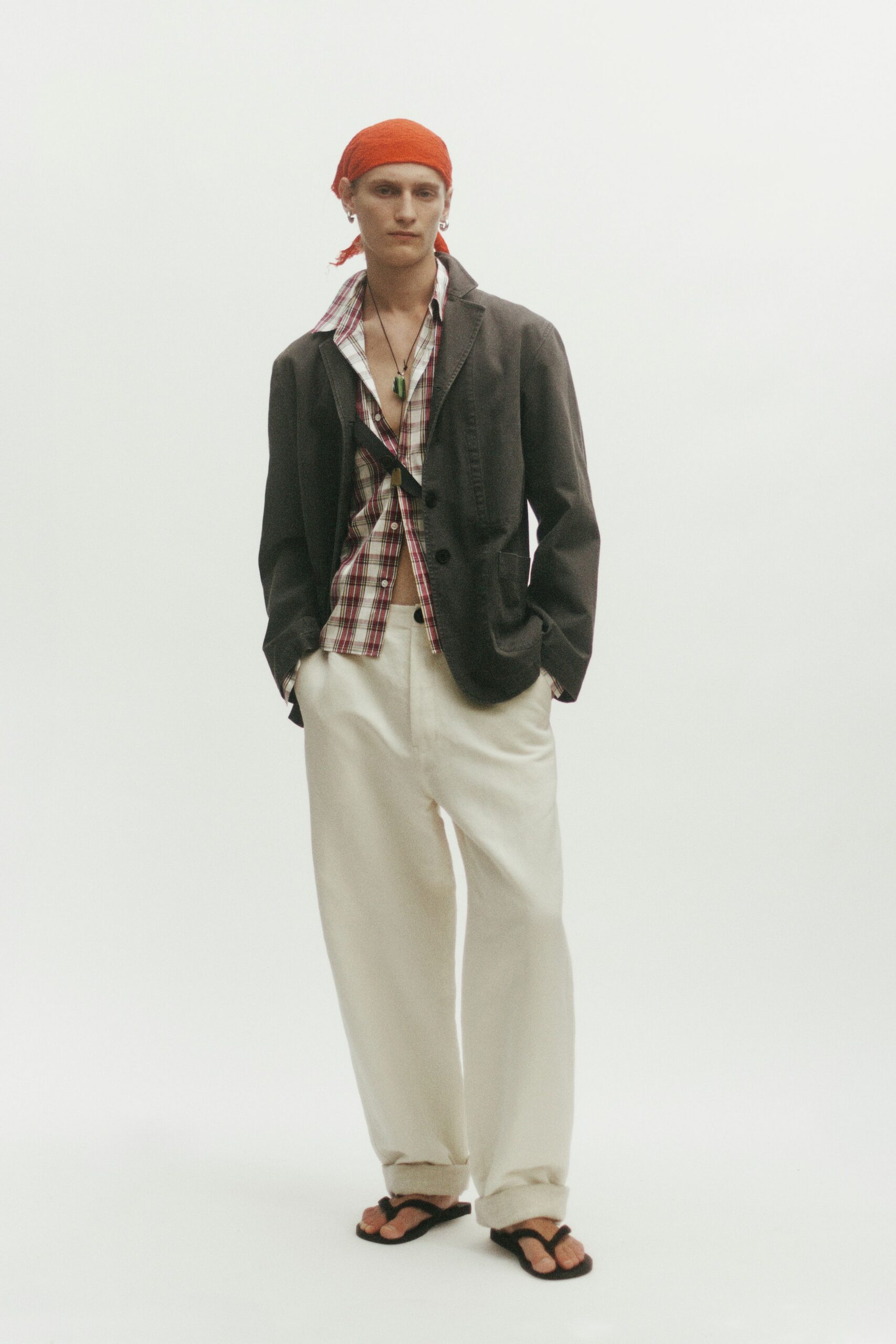 black cotton long-sleeve collared structured buttoned blazer