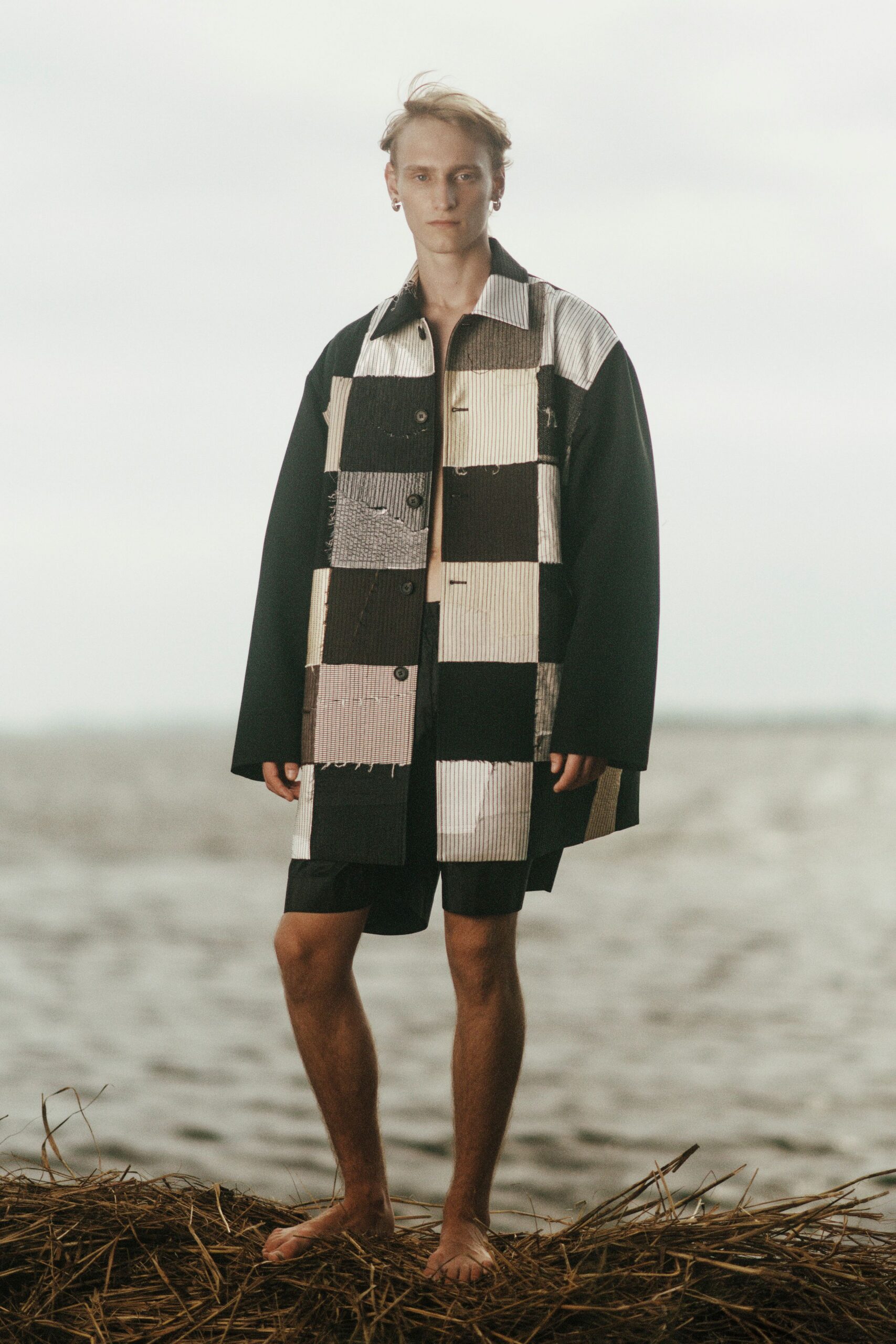 black cotton long-sleeve collared relaxed color-blocked coat