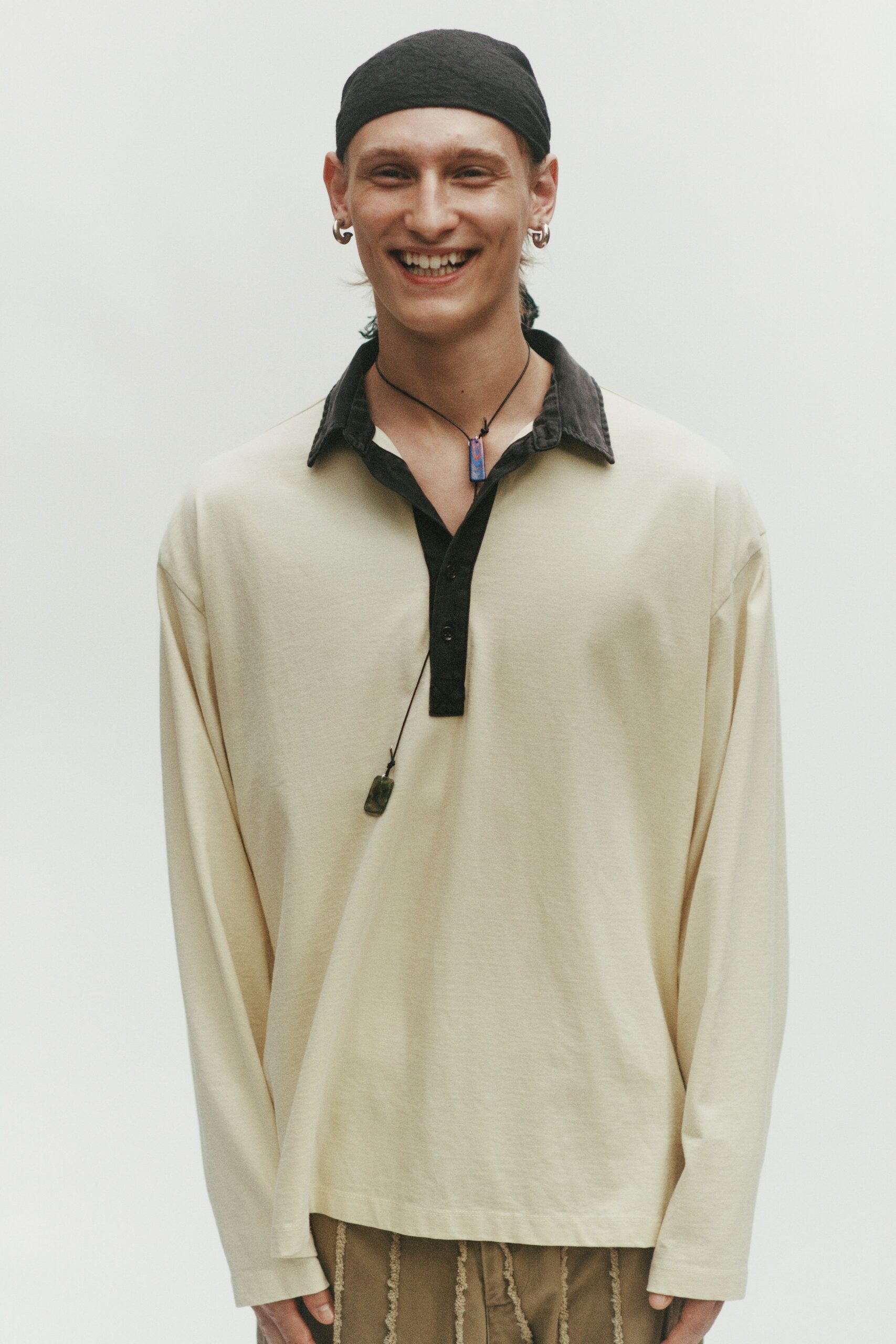 beige relaxed shirt with brown pants