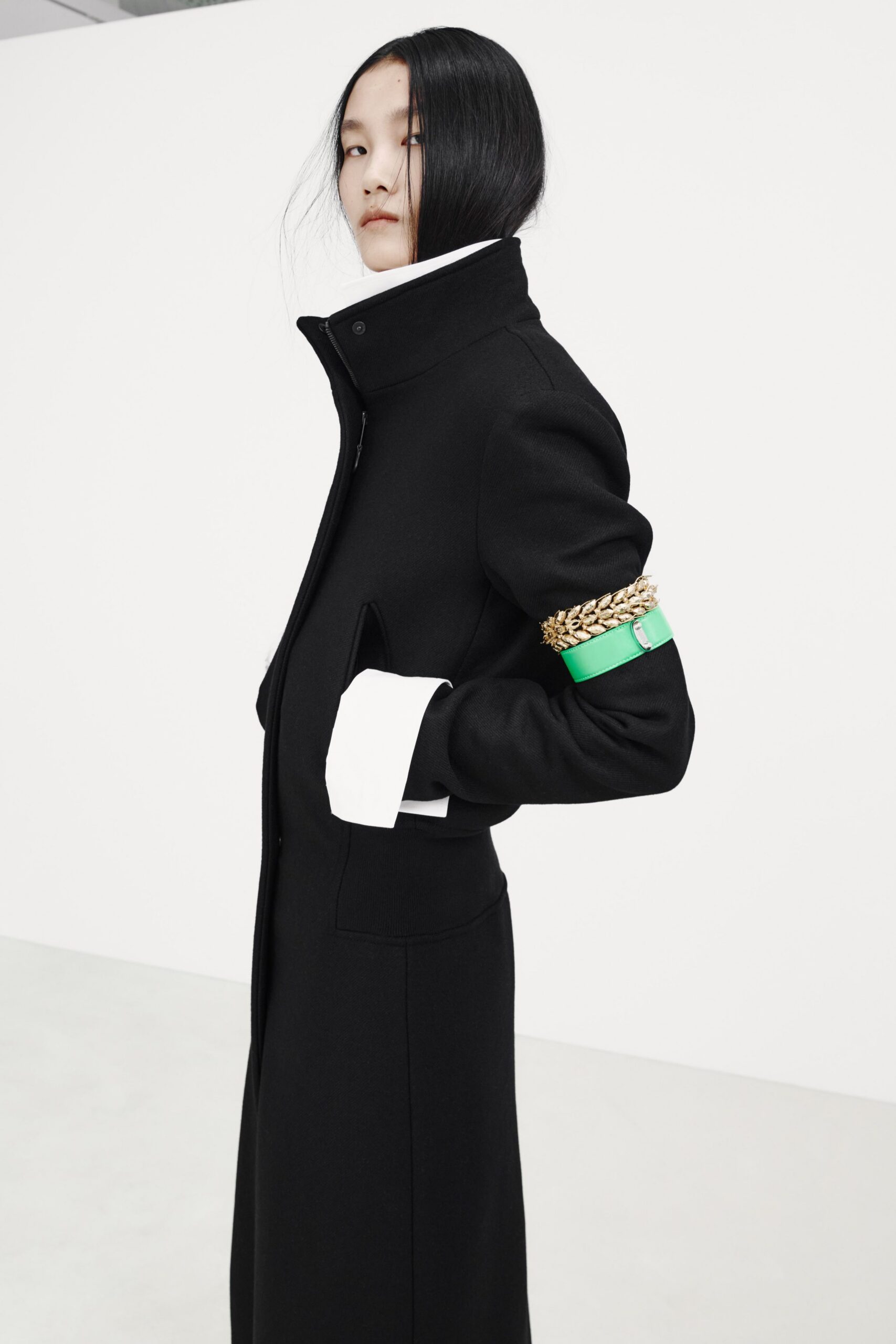 black wool long-sleeve collared fitted buttoned maxi coat