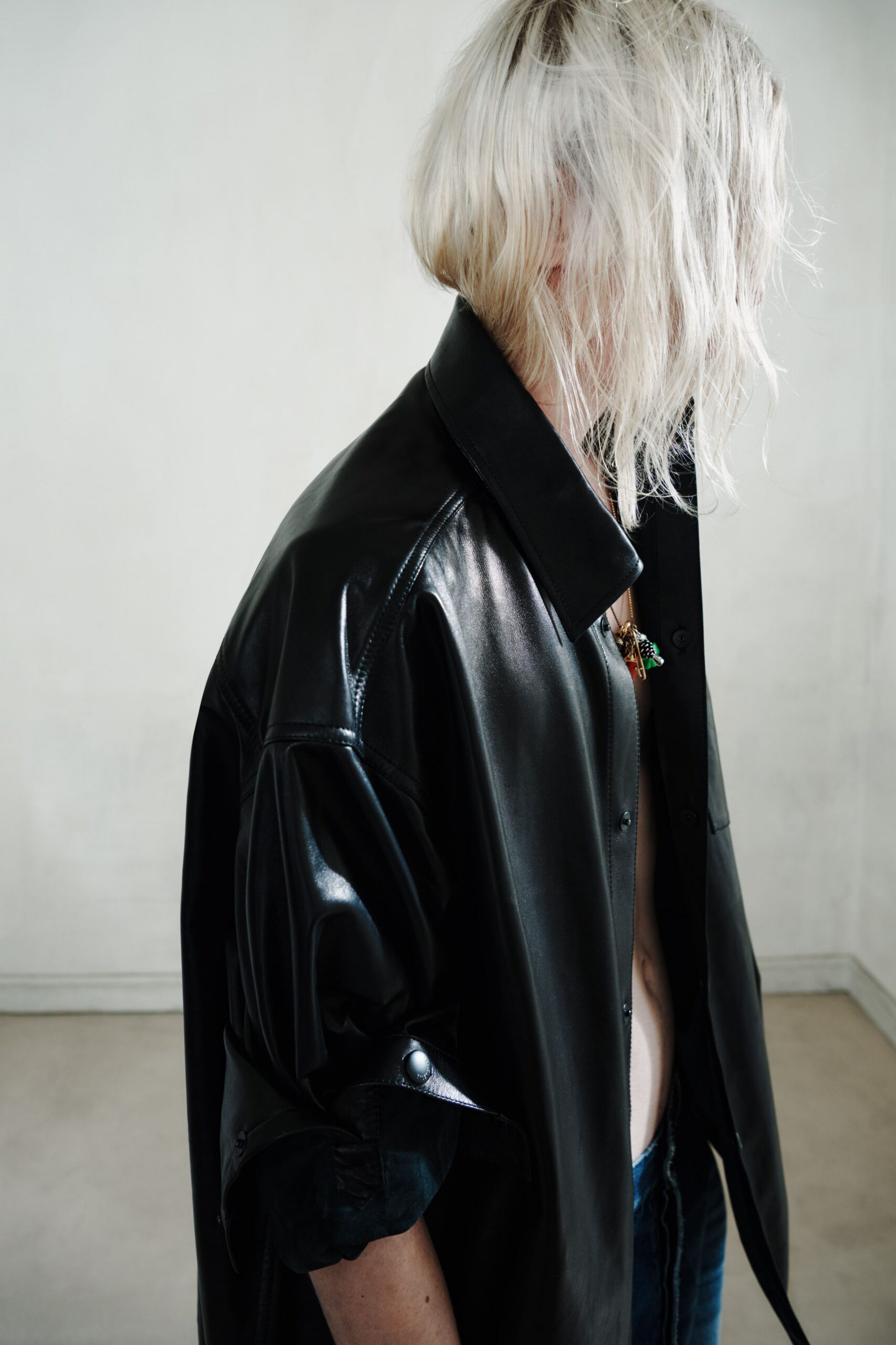 black leather long-sleeve collared relaxed shirt
