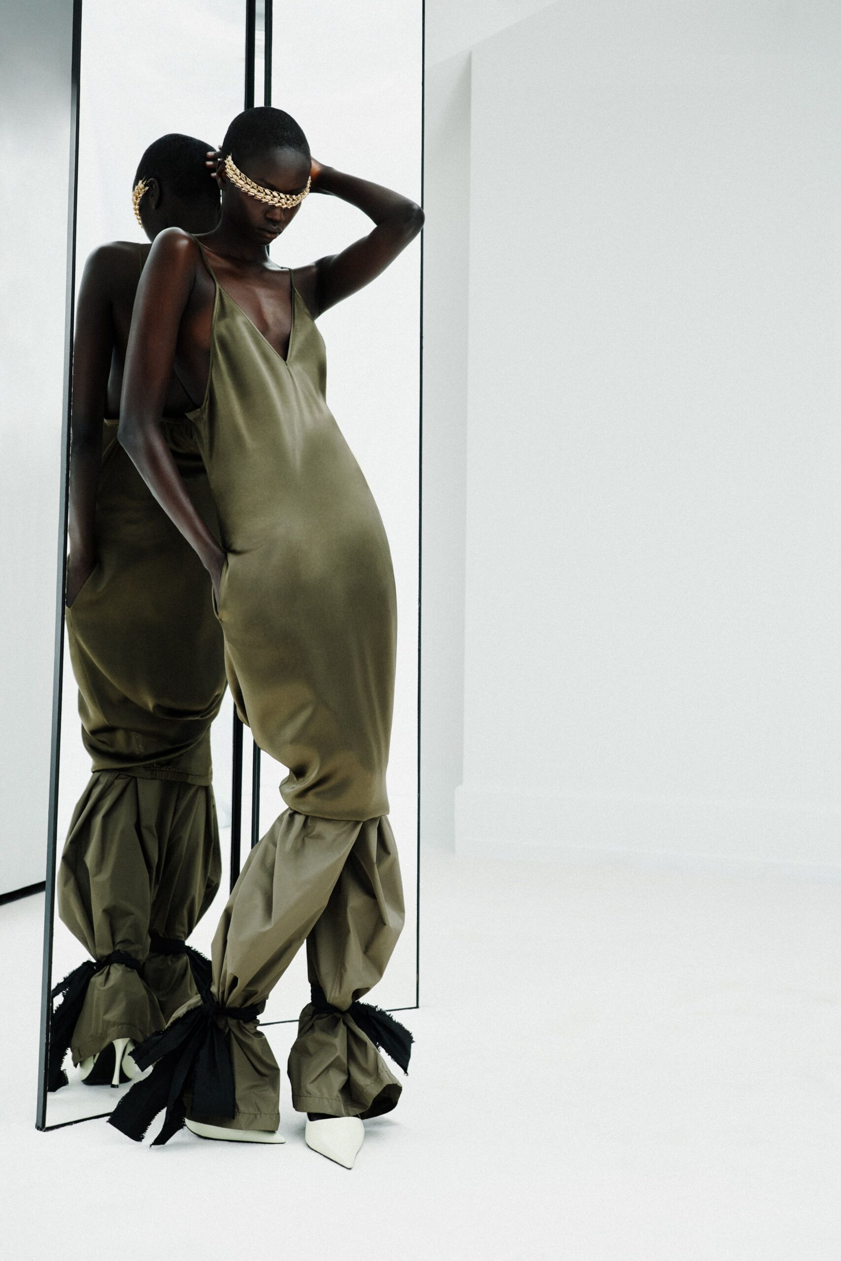 green silk sleeveless v-neck fitted draped flowing dress