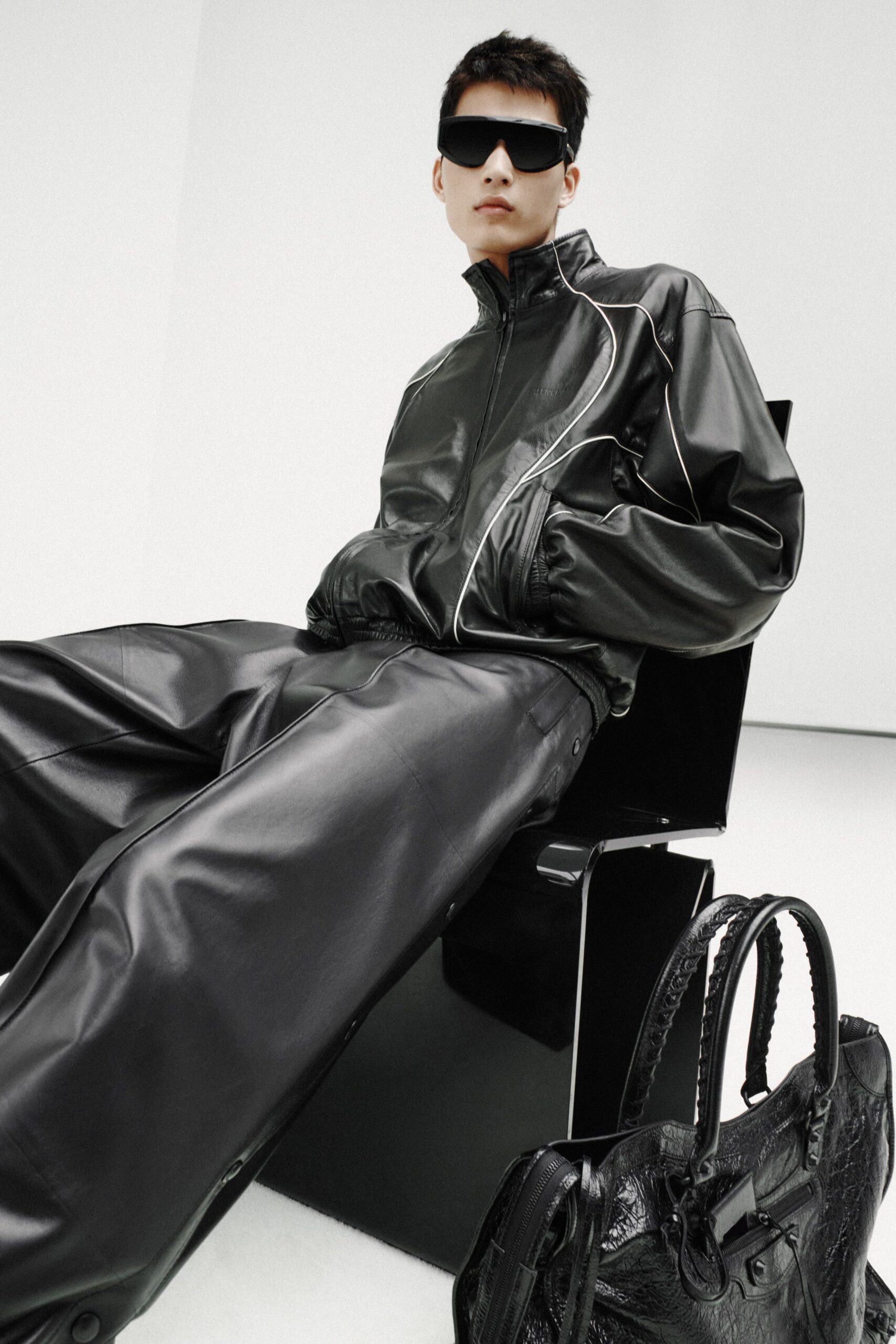 black leather long-sleeve collared relaxed zippered jacket