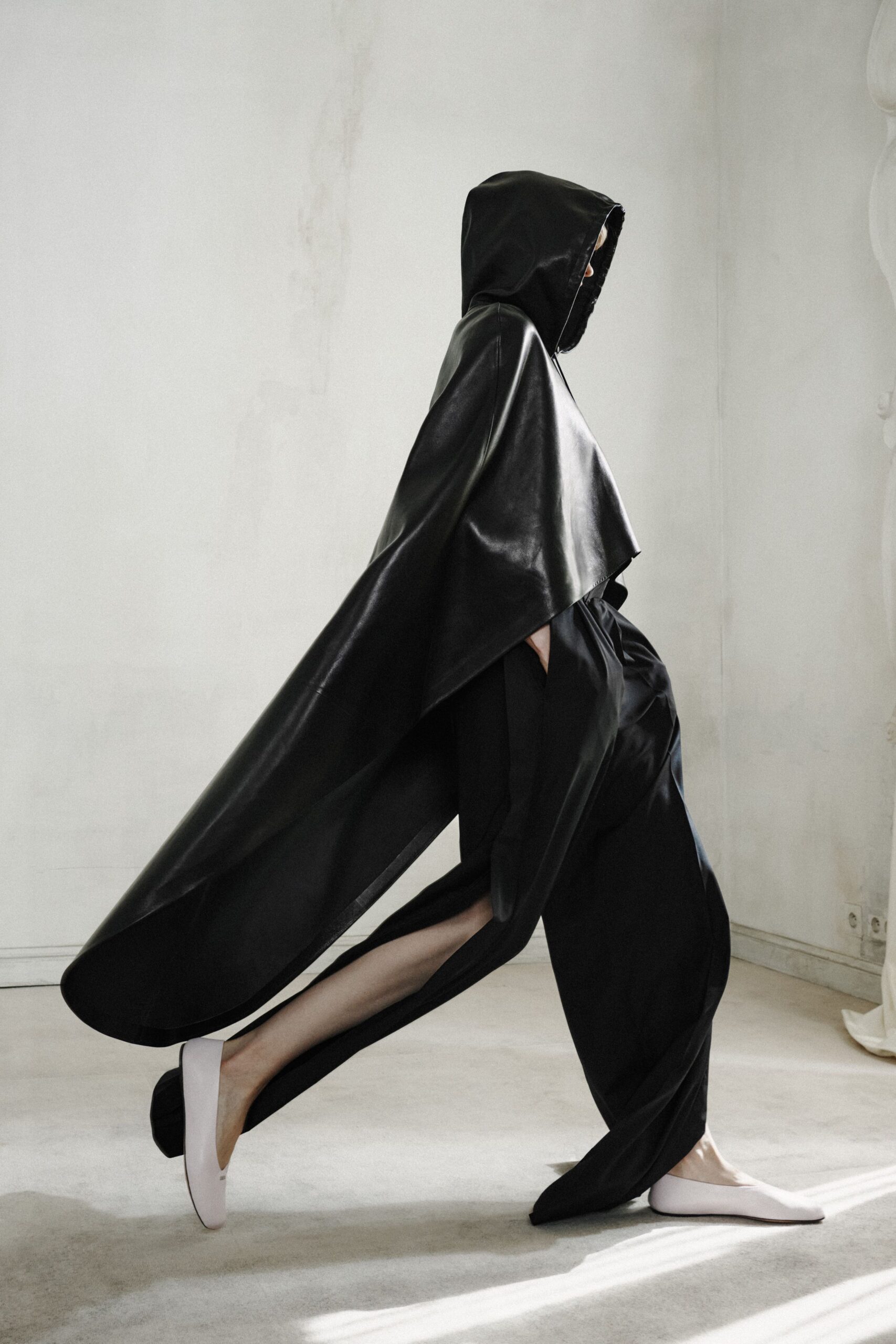 black leather hooded relaxed cape