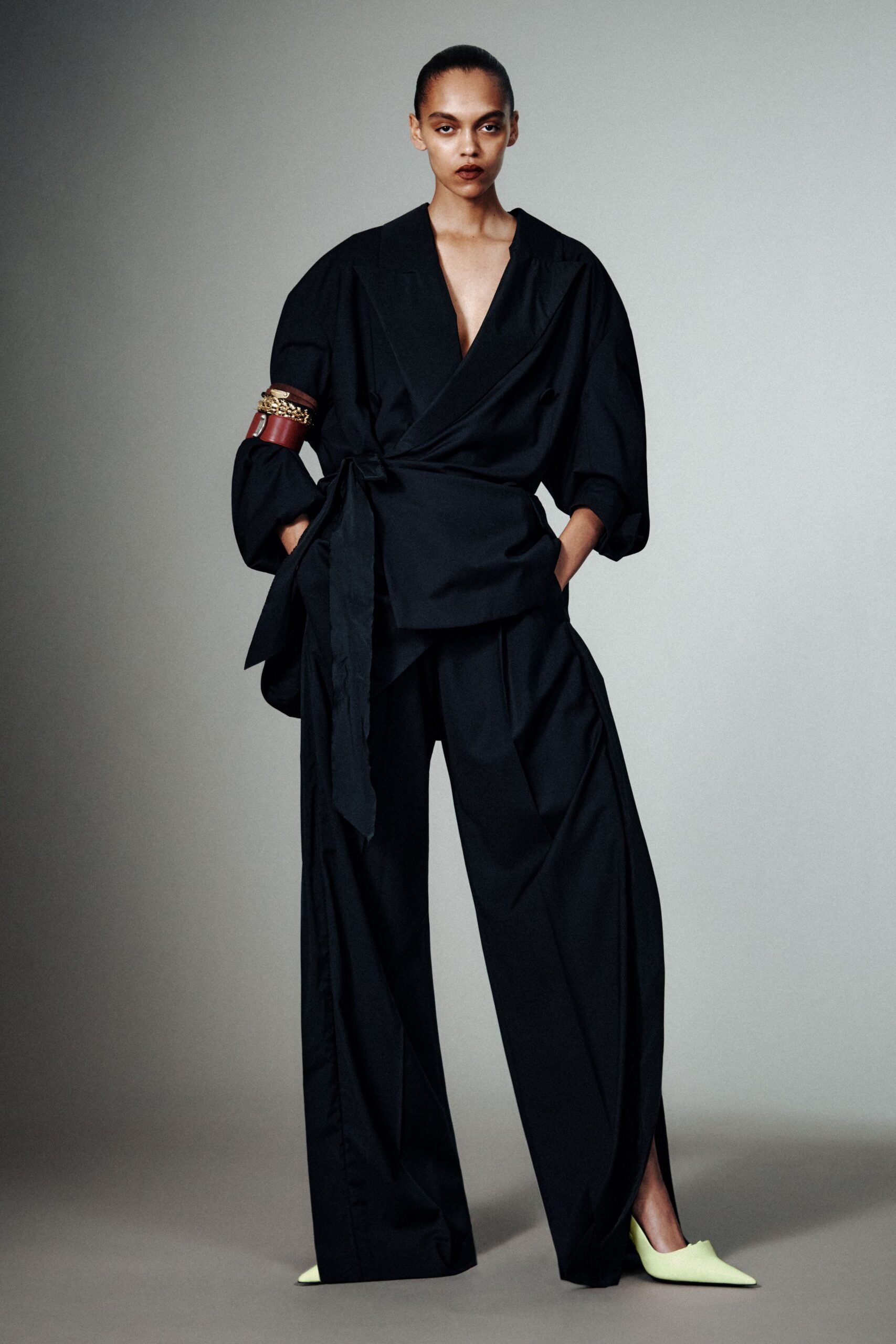 black cotton long-sleeve v-neck relaxed pleated top