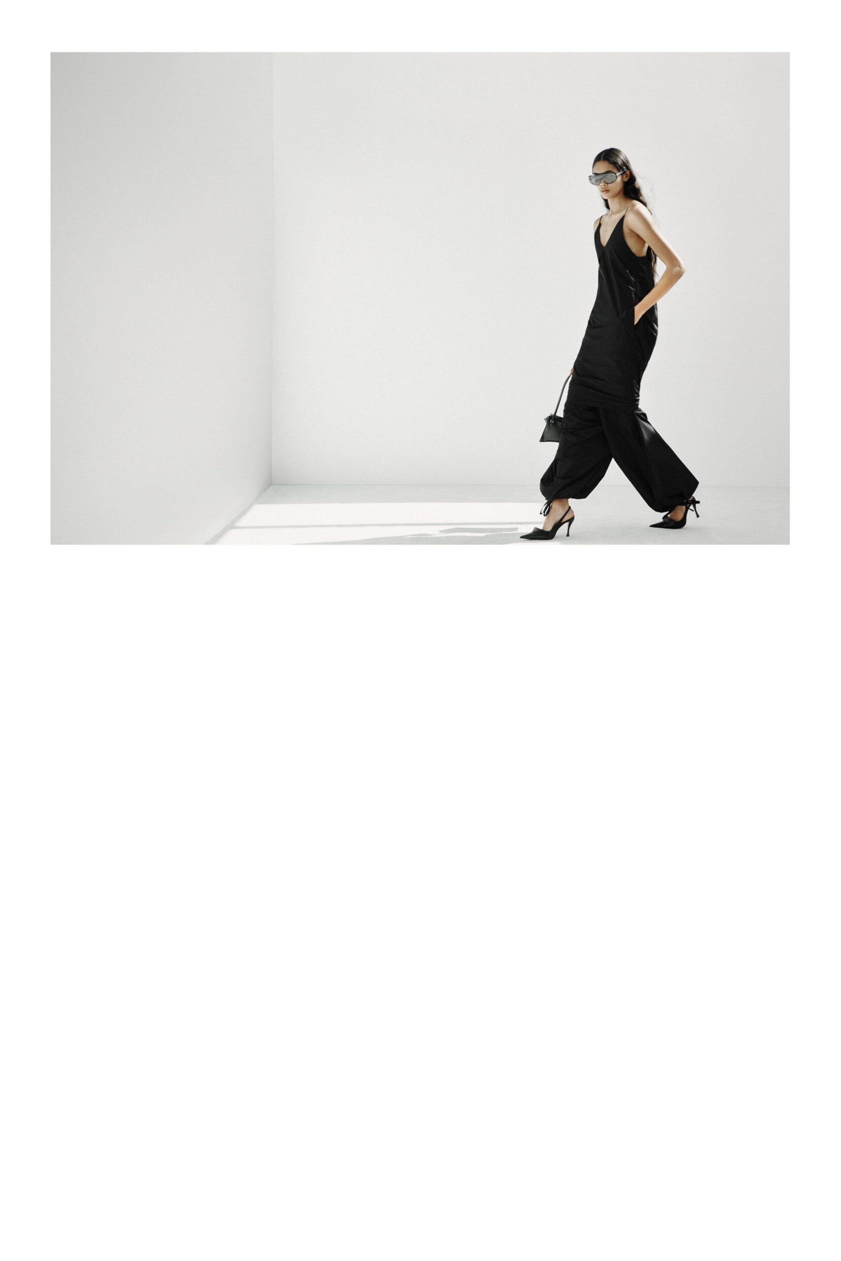 black cotton sleeveless v-neck fitted wide-leg jumpsuit