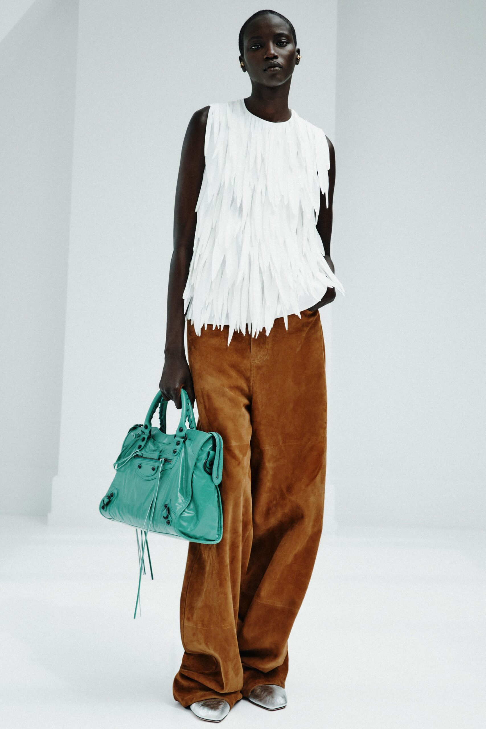 white silk sleeveless fitted fringed top
