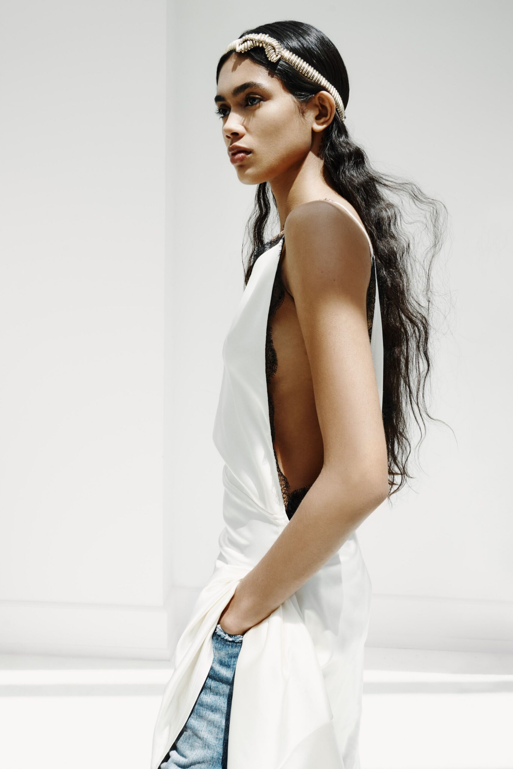 white silk sleeveless backless fitted draped dress