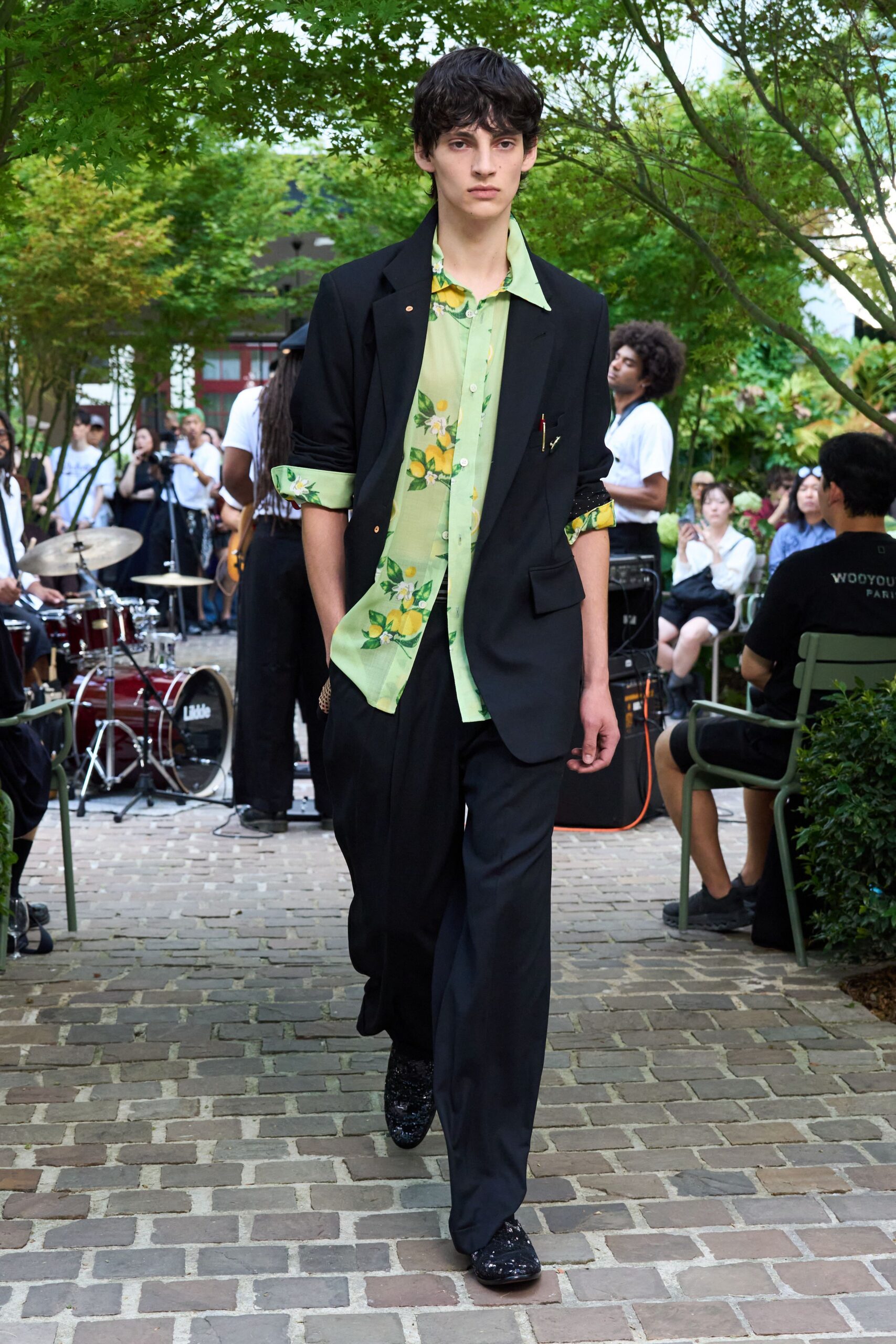 black tailored blazer with green shirt