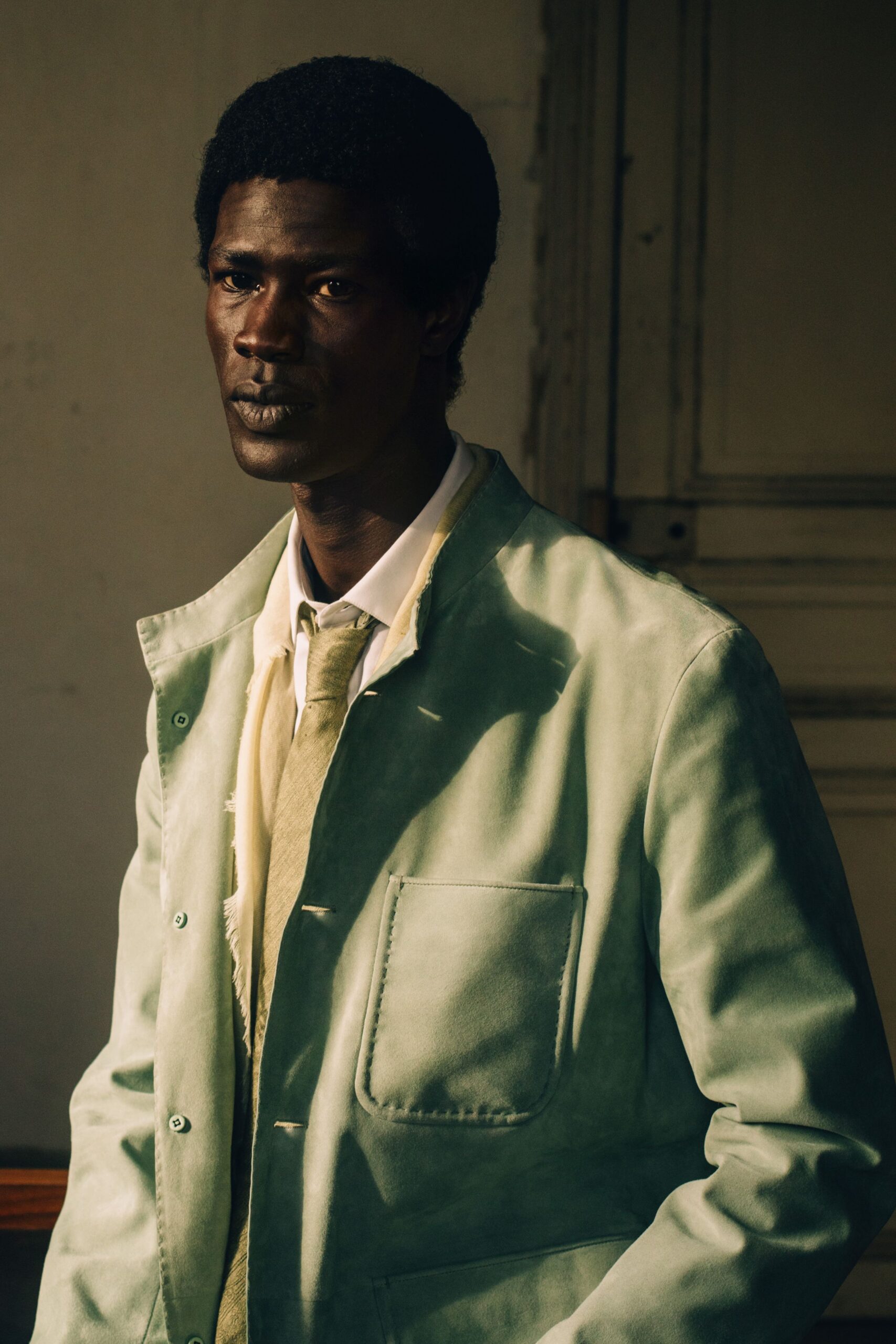 green leather jacket with white shirt