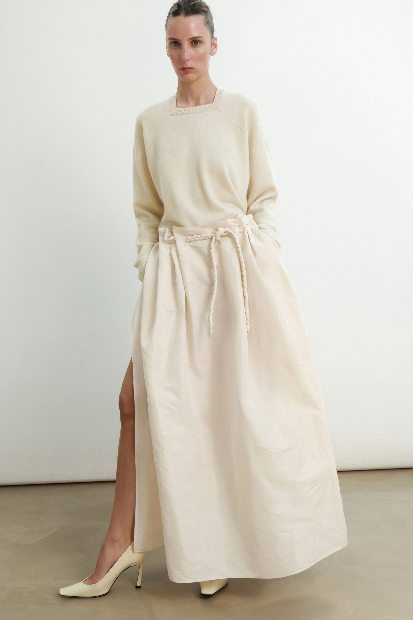 ivory cotton slit fitted high-waisted pleated maxi skirt