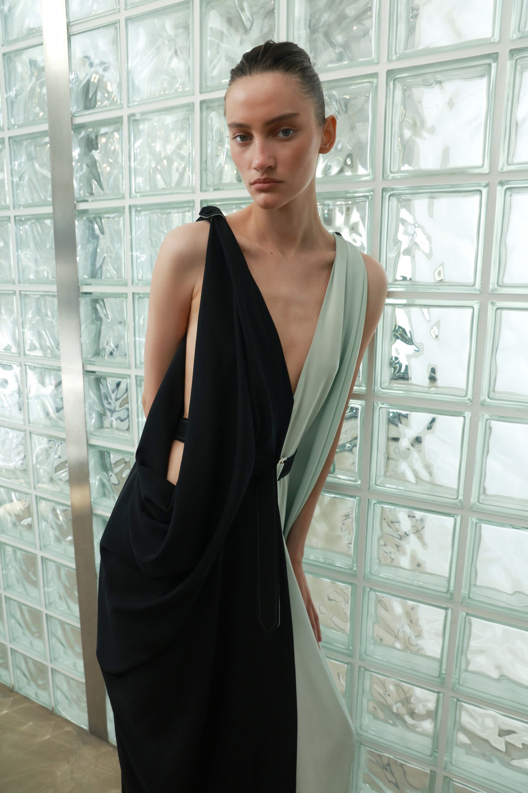 black and green draped dress