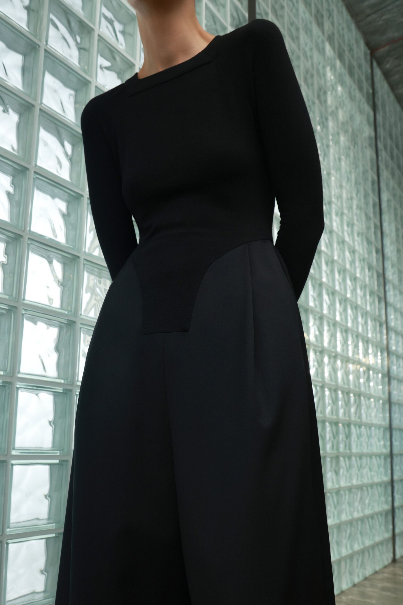 black fitted long-sleeve dress