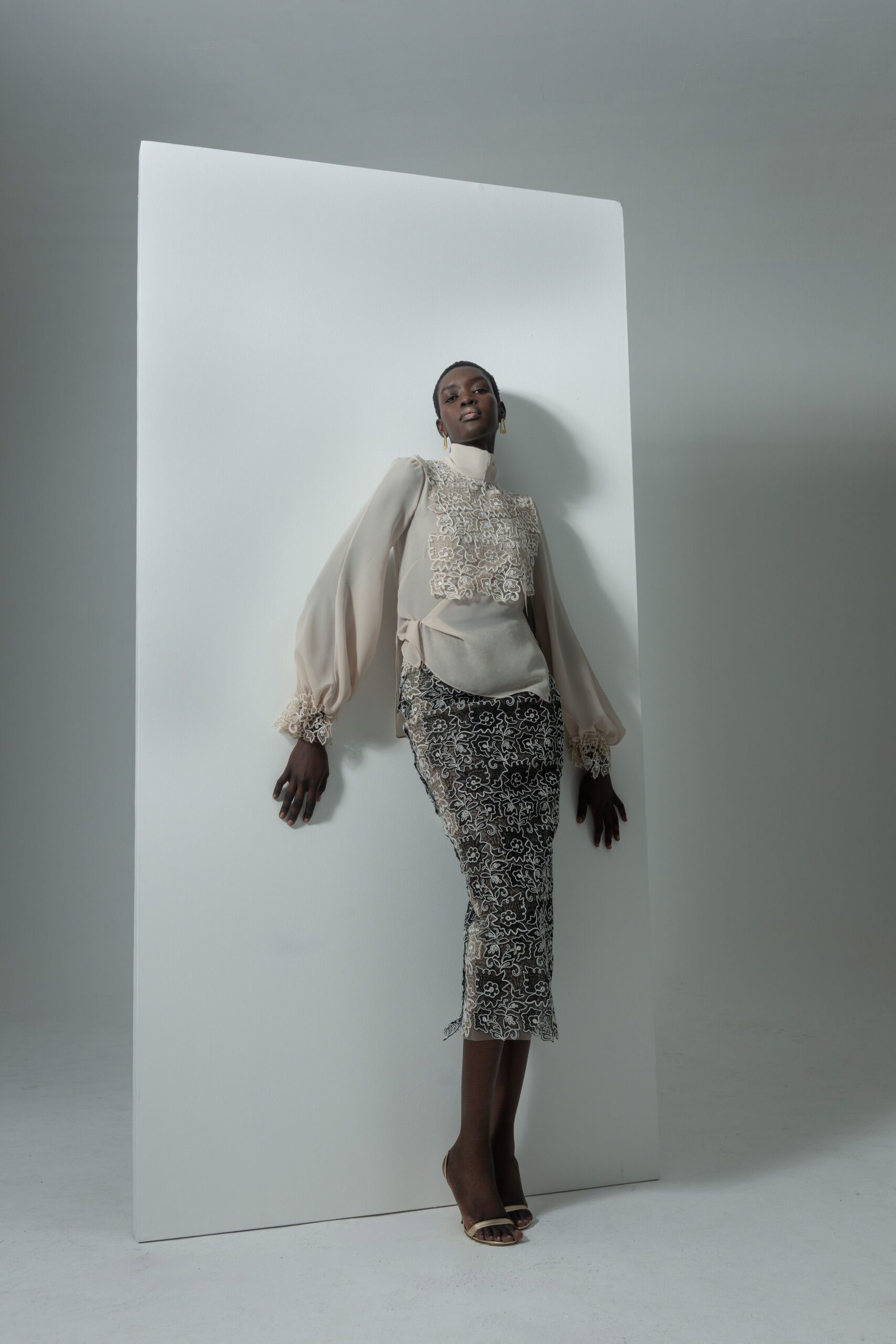 beige silk long-sleeve high-neck fitted embroidered blouse
