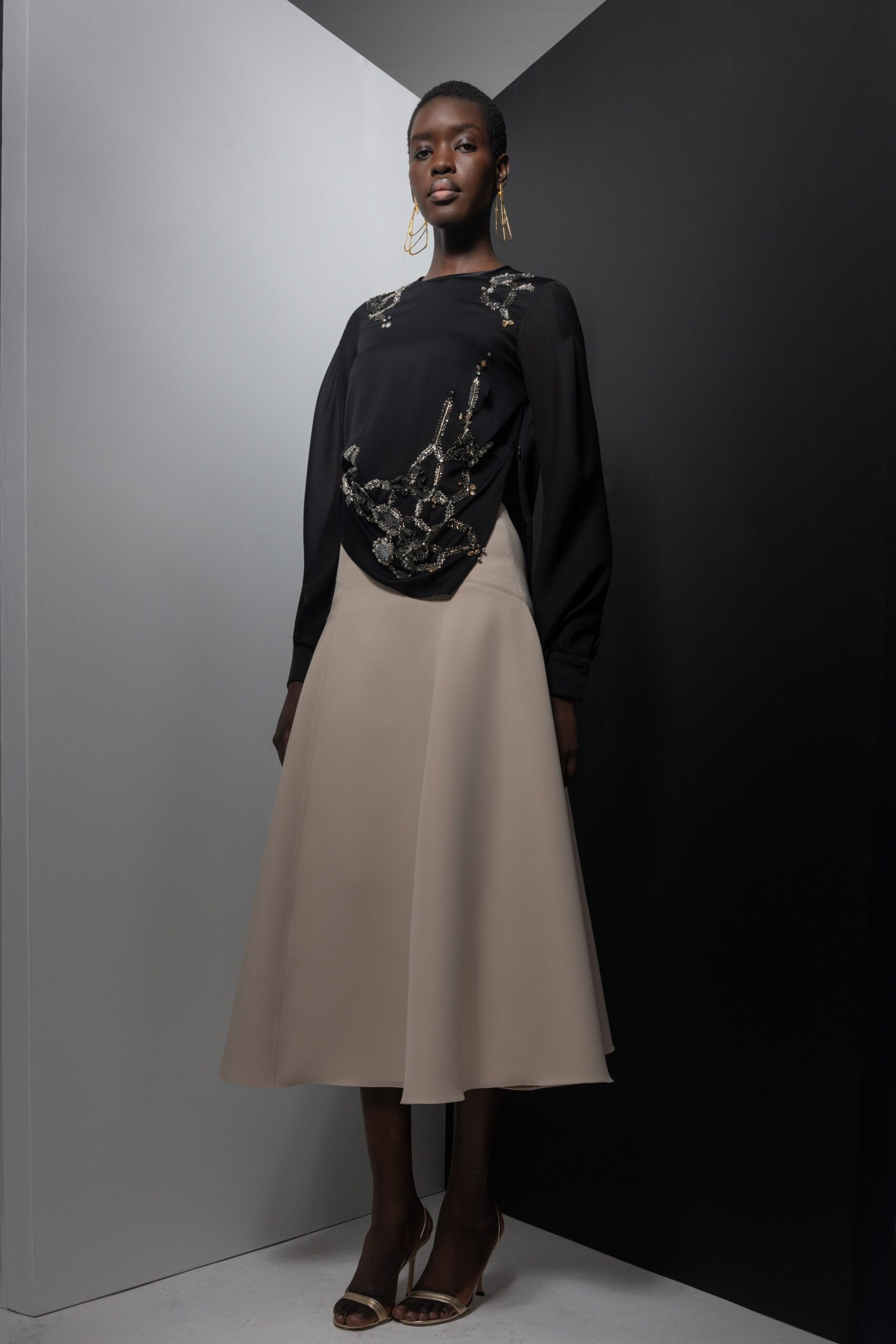 beige silk fitted high-waisted a-line pleated midi skirt