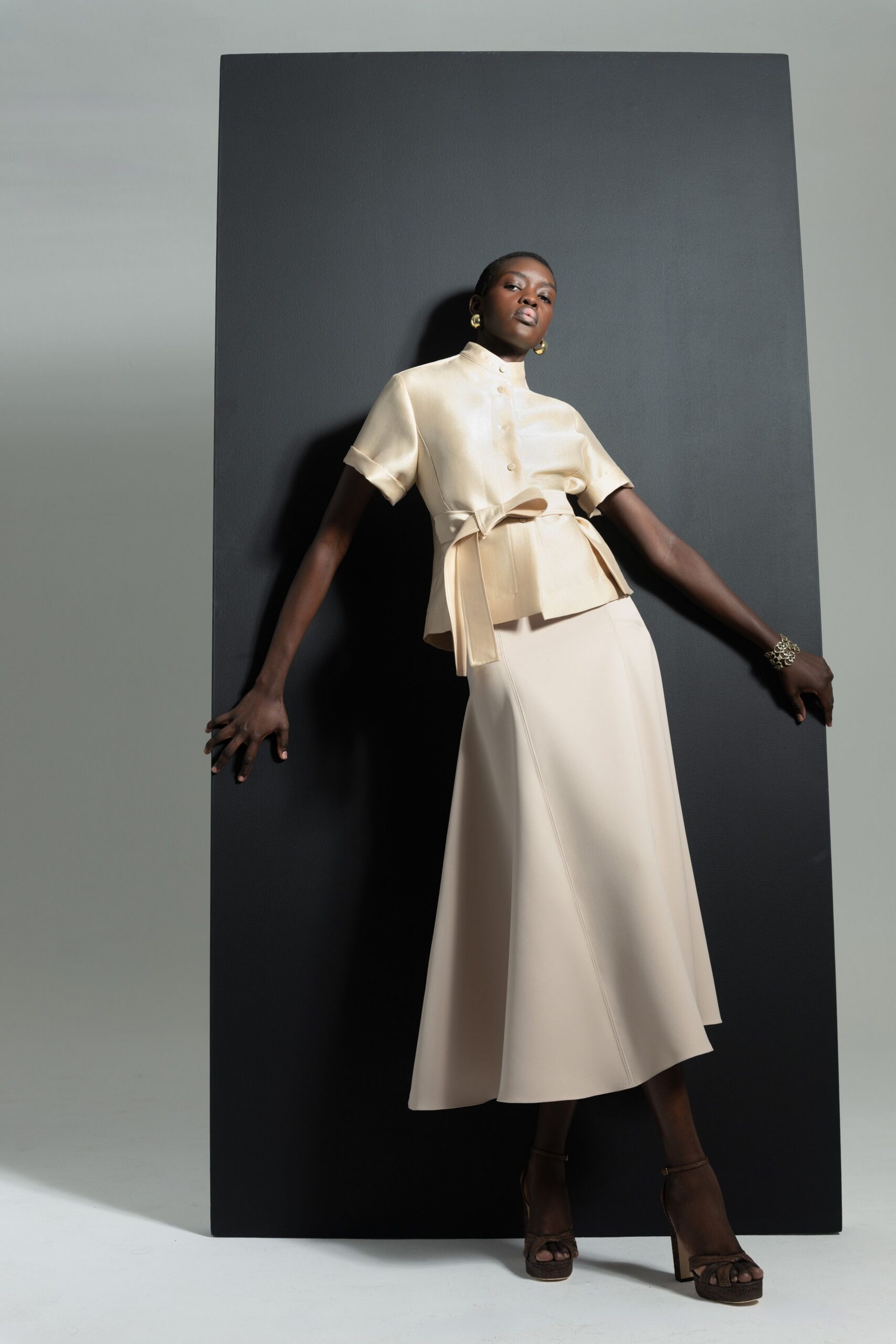 beige silk fitted flared midi skirt