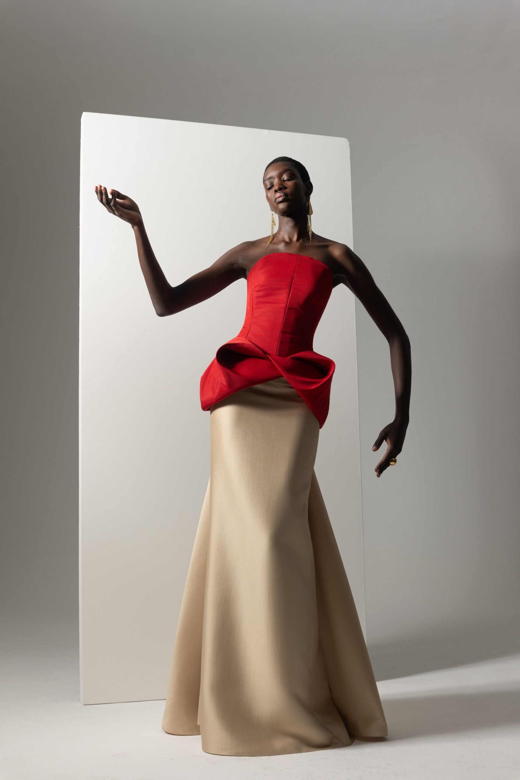 red silk strapless gown