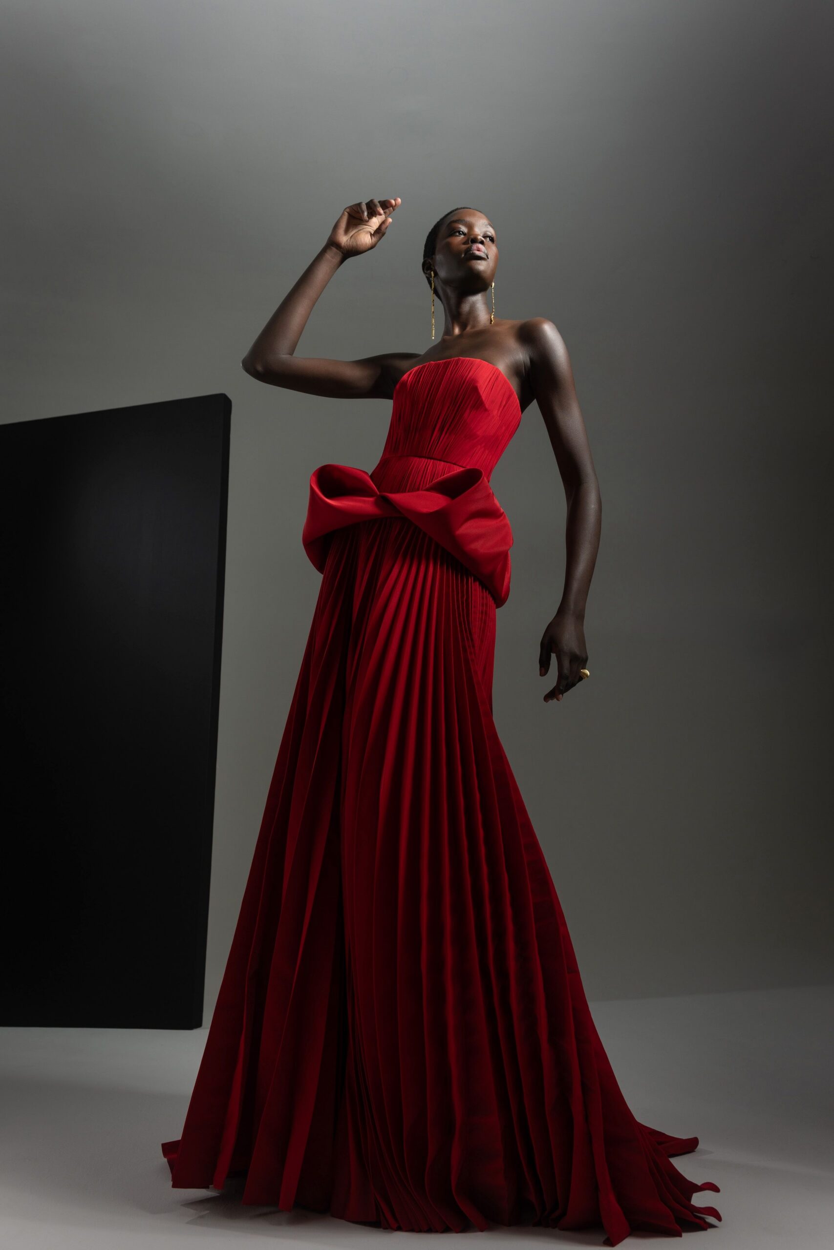 red silk strapless gown