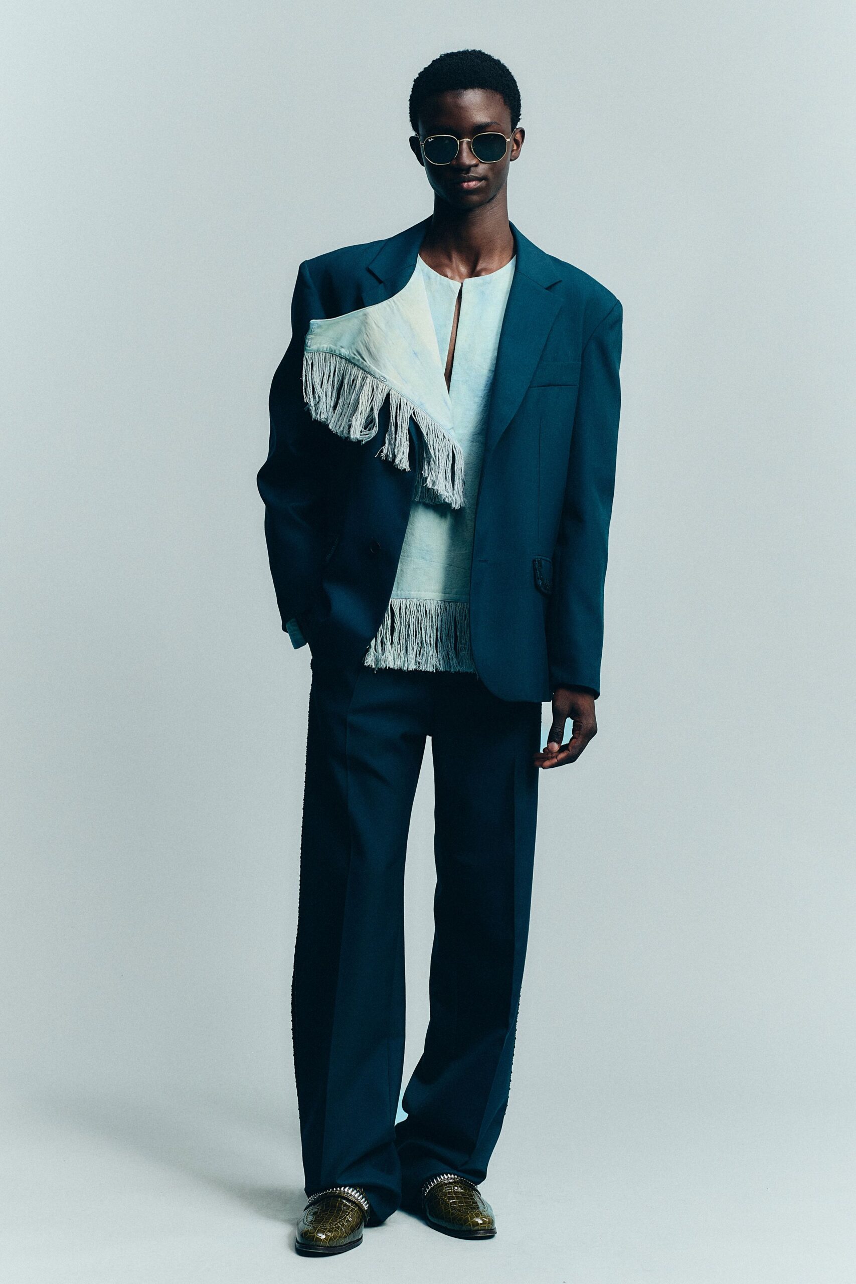blue blazer with fringed top
