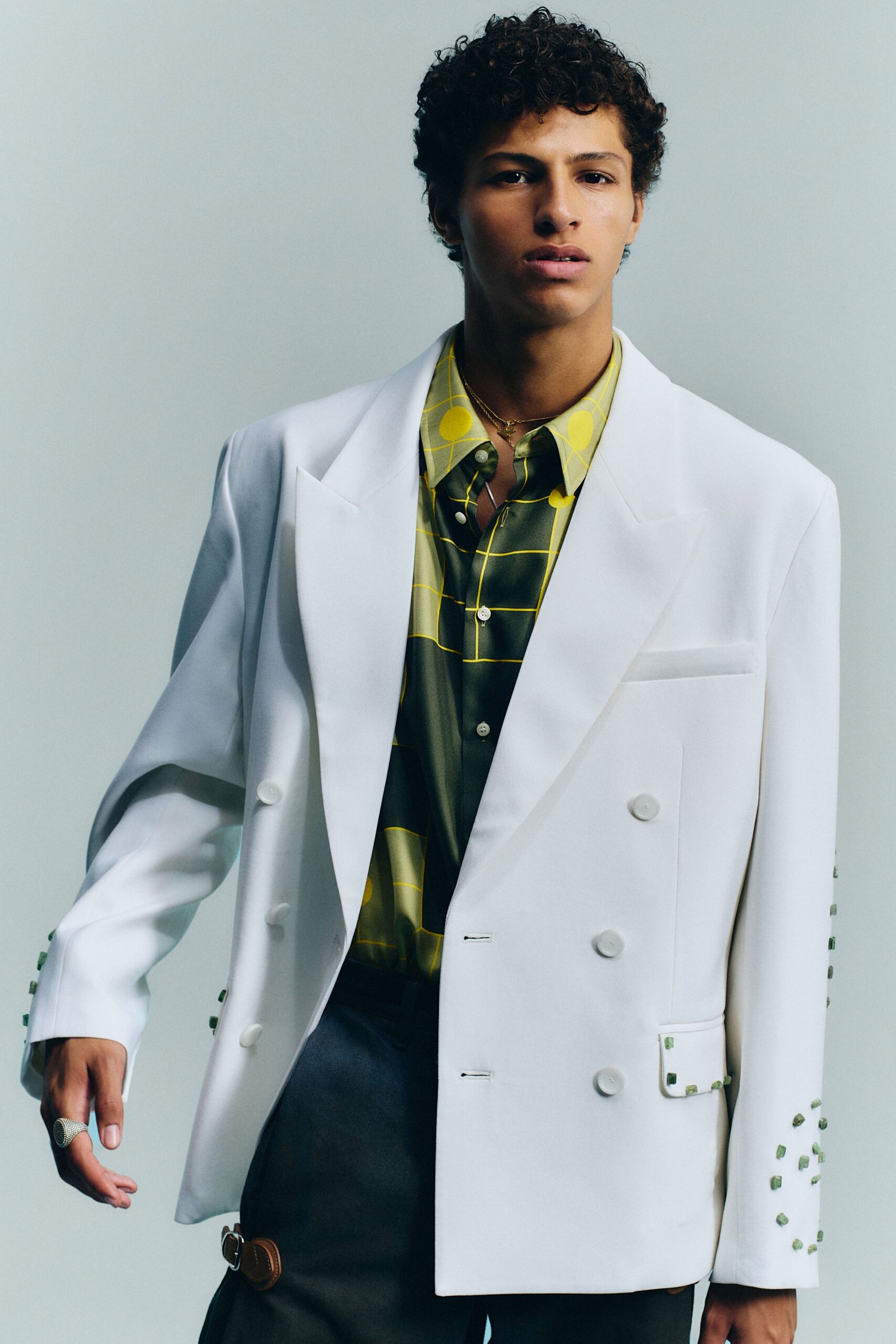 white cotton long-sleeve collared structured buttoned blazer