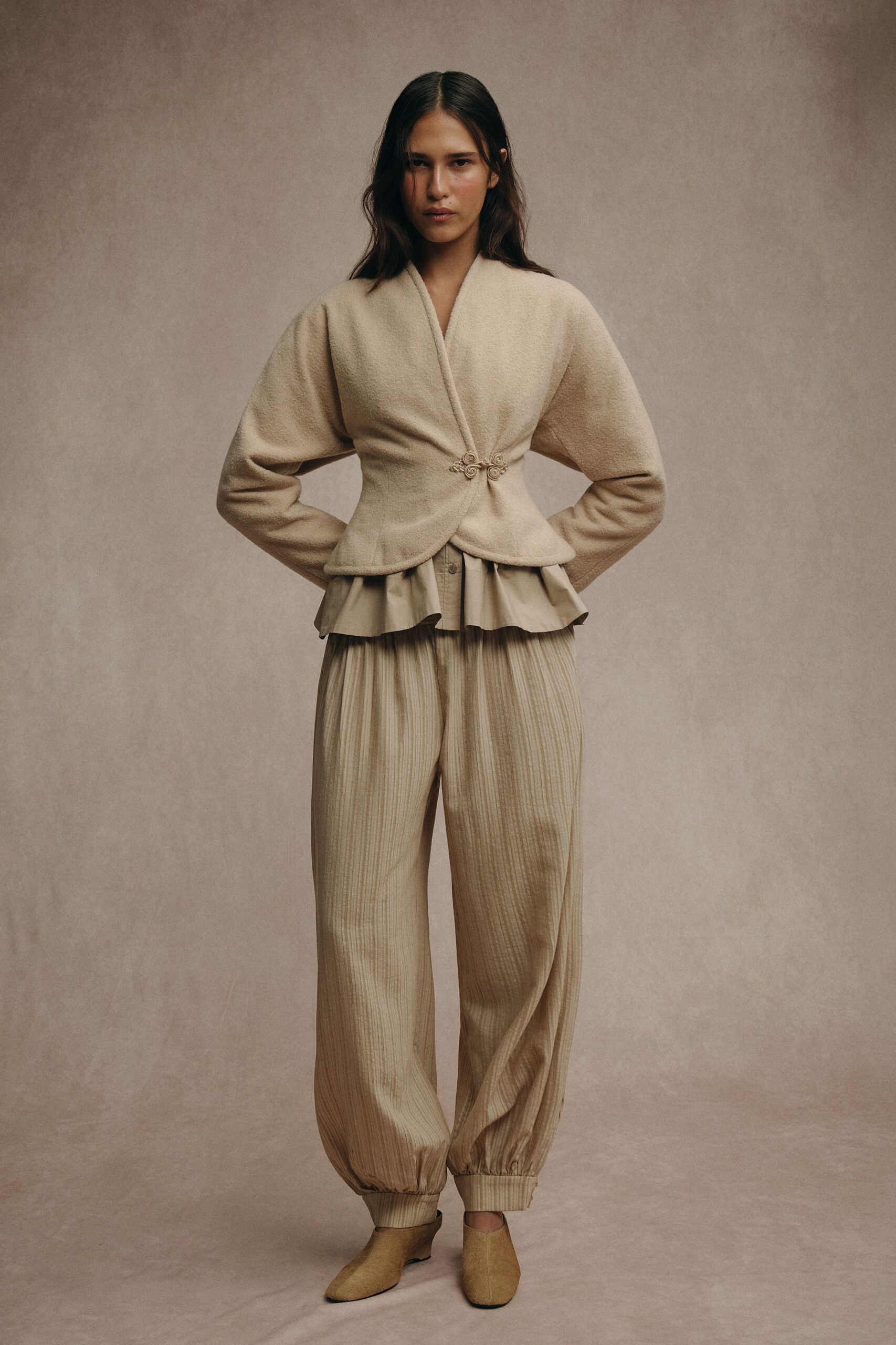 beige wool long-sleeve collared fitted draped jacket