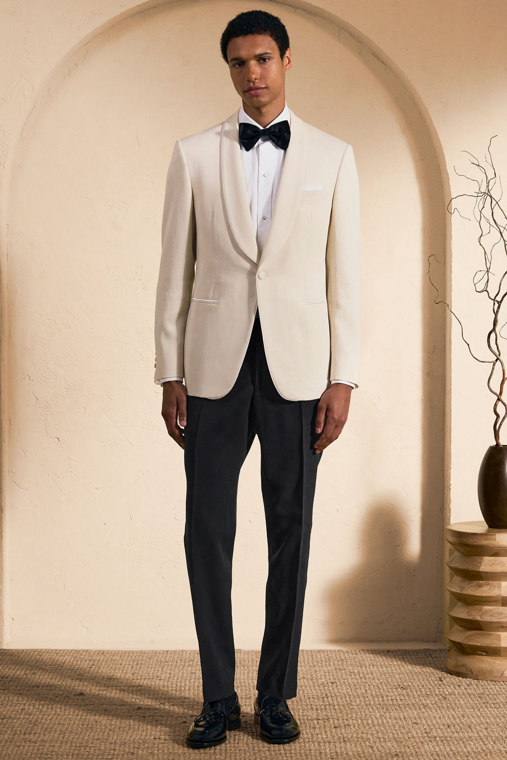 white blazer black pants outfit
