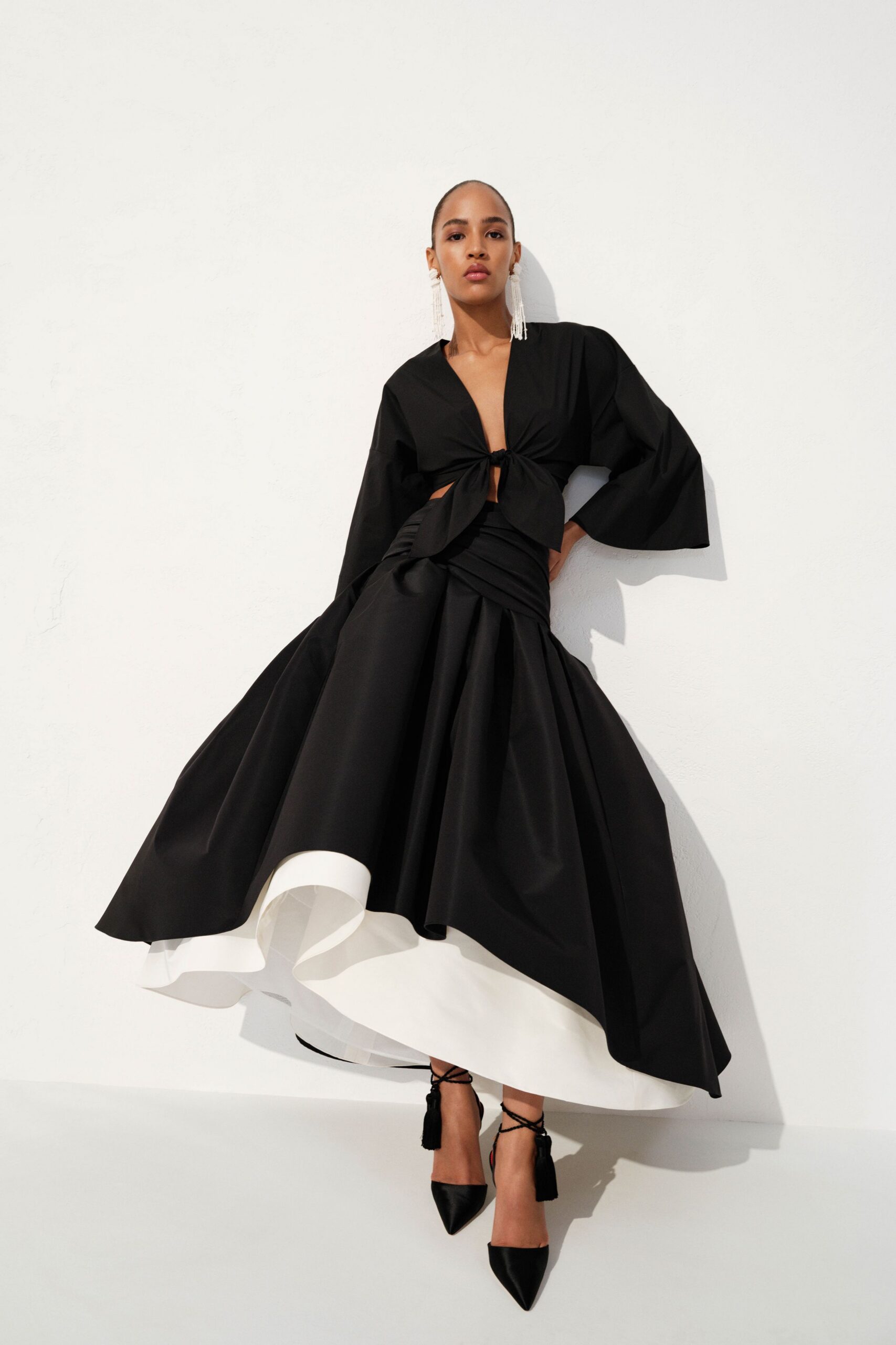 black cotton long-sleeve v-neck fitted pleated tiered dress