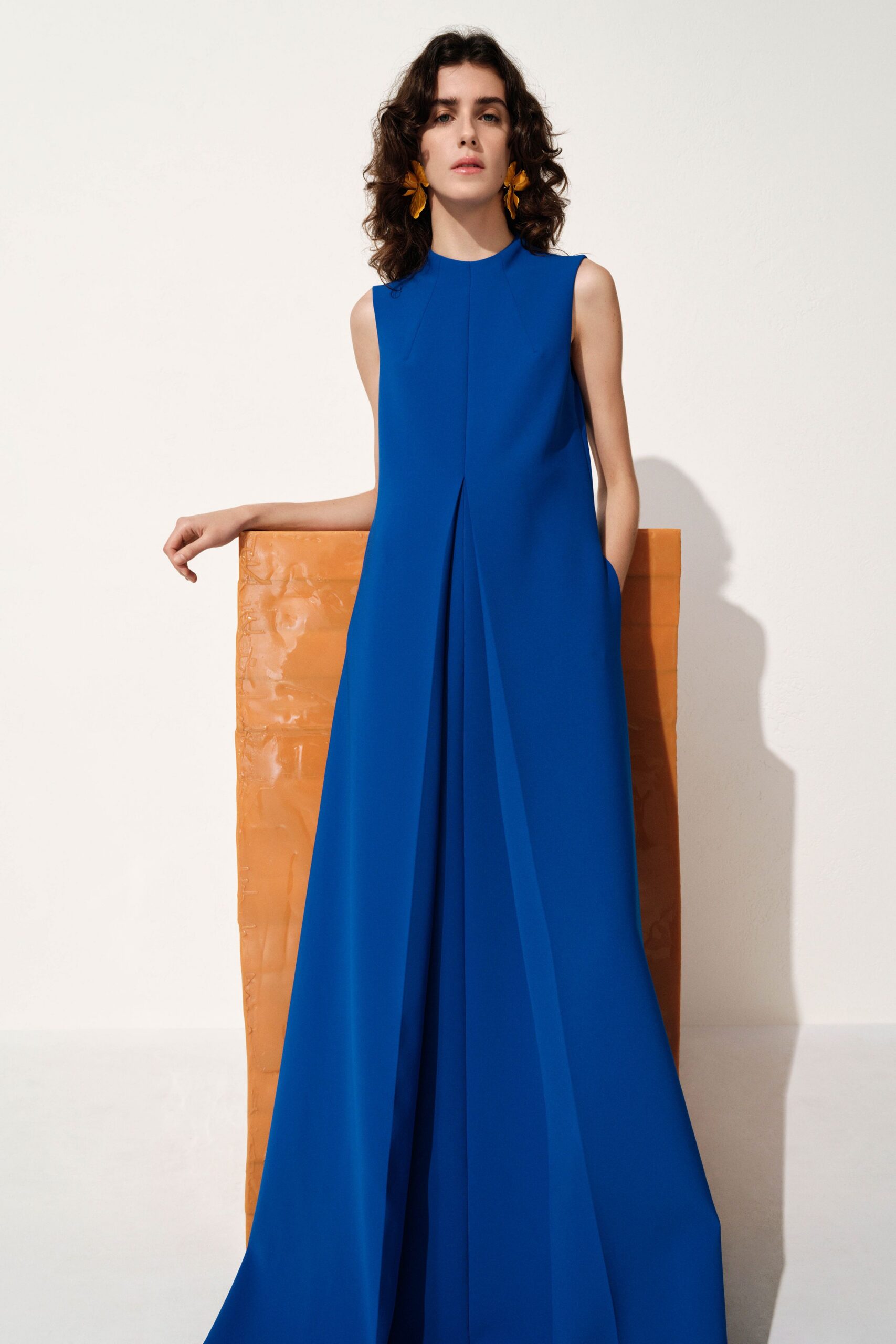 blue silk sleeveless gown