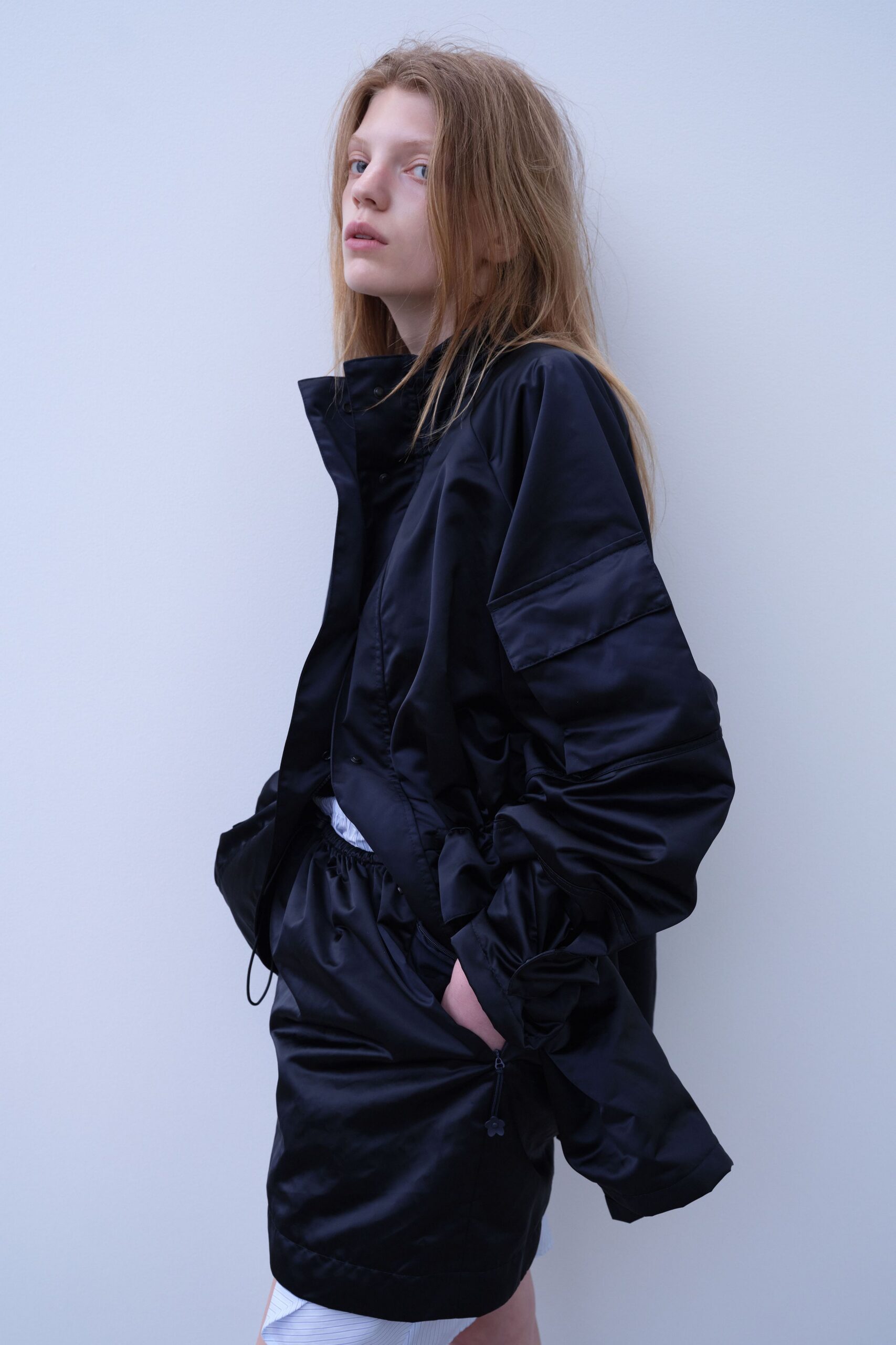 black oversized jacket and relaxed skirt
