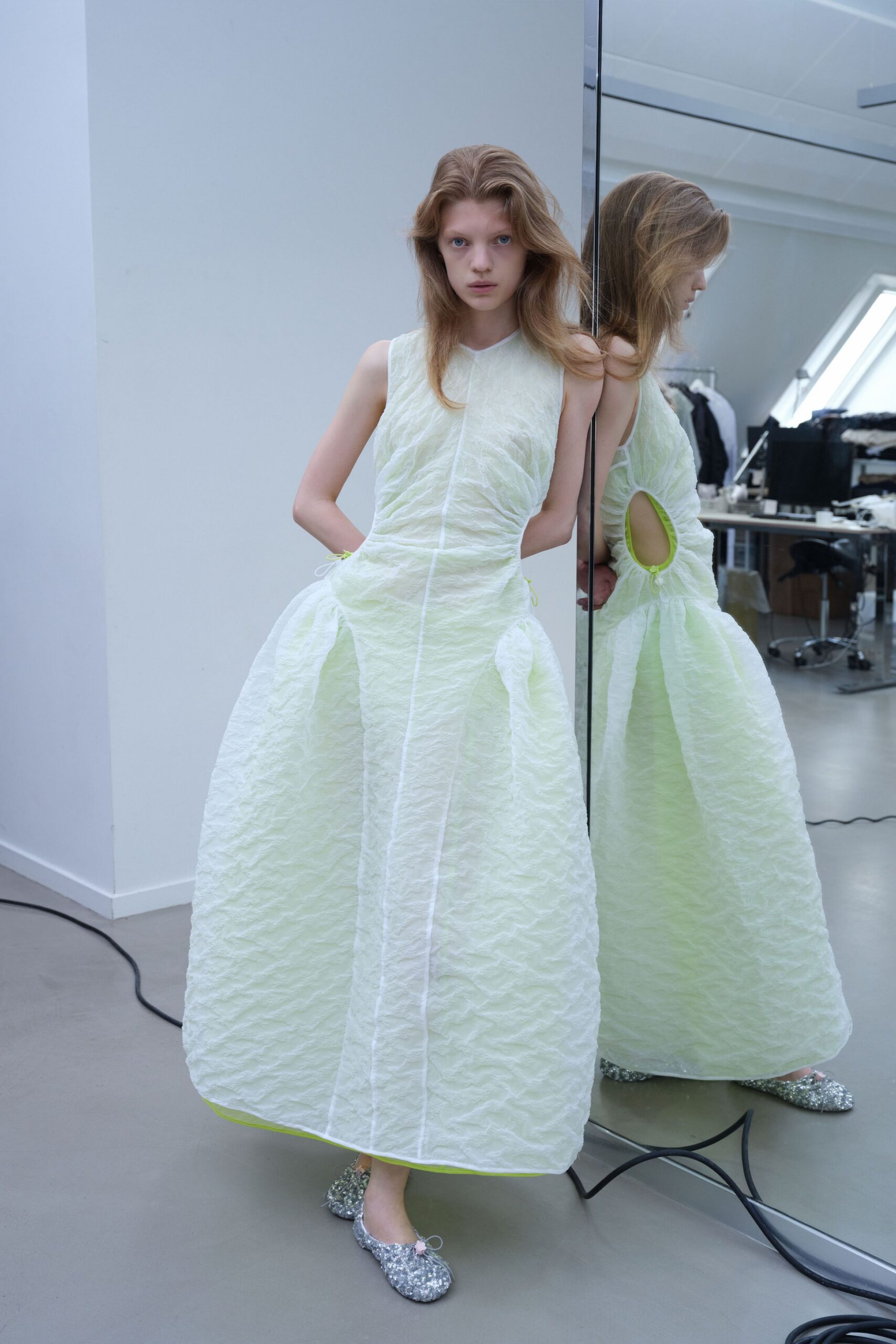 green cotton sleeveless high-neck fitted pleated layered dress