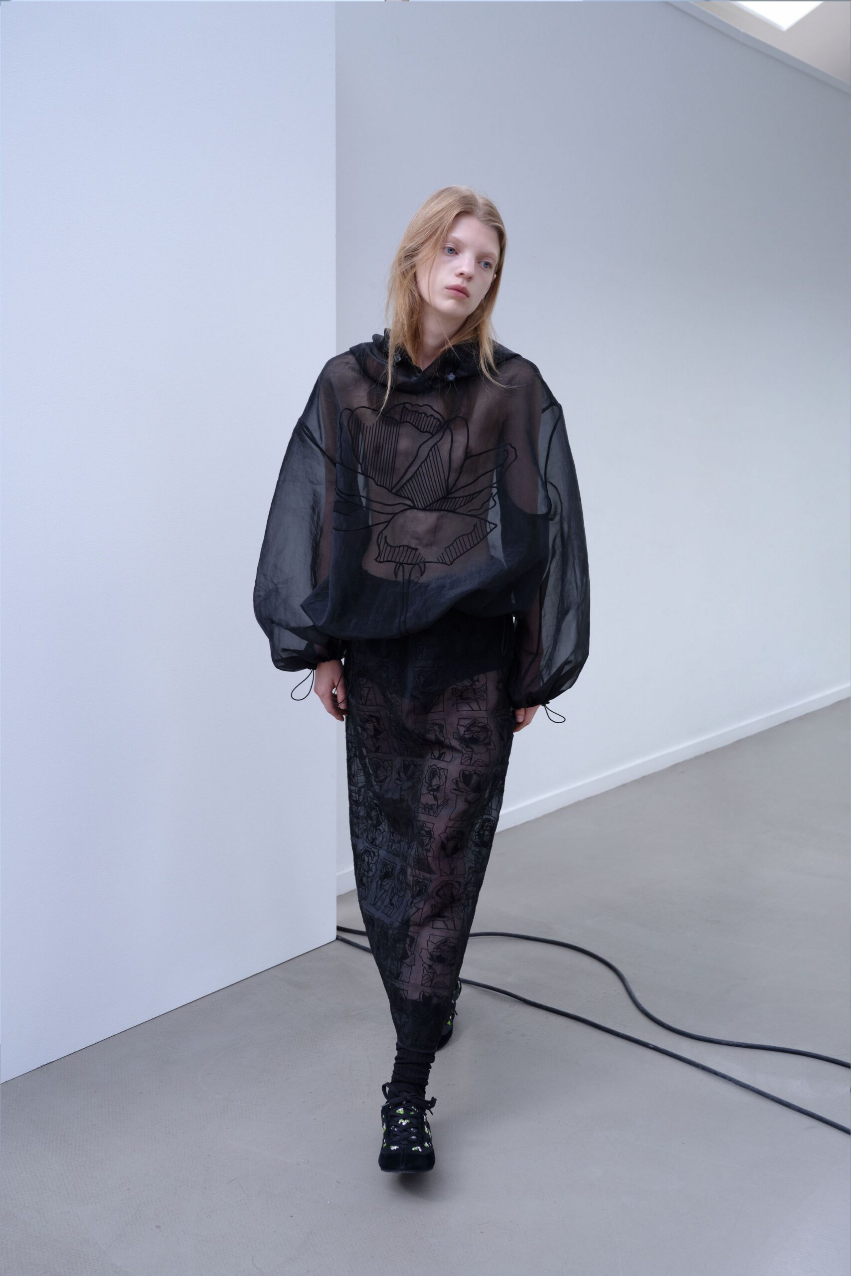 black sheer top and skirt