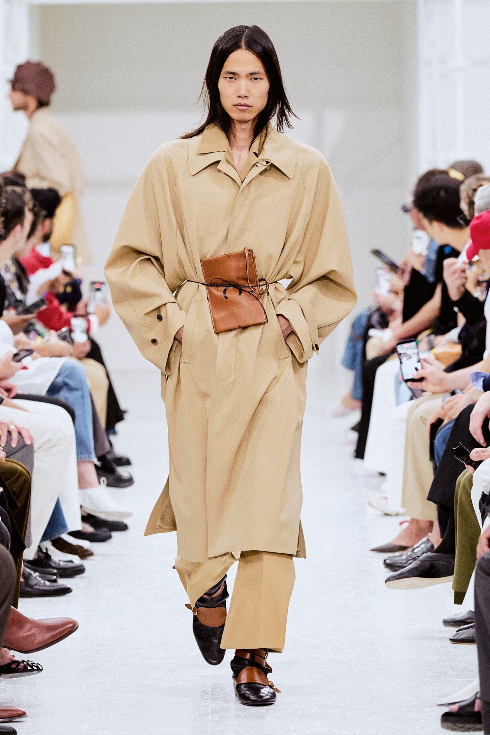 beige oversized coat with brown bag