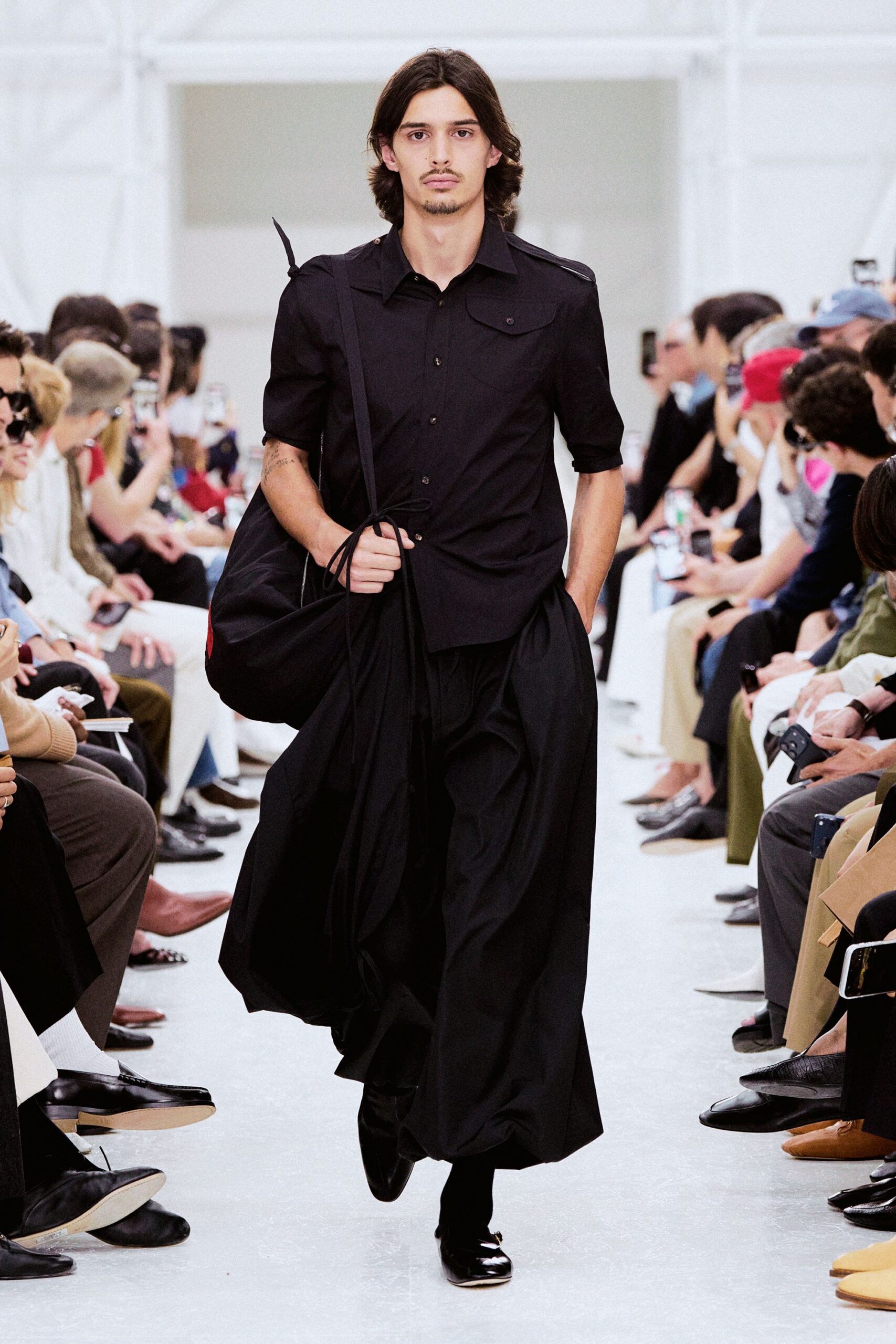 black fitted shirt with relaxed pants