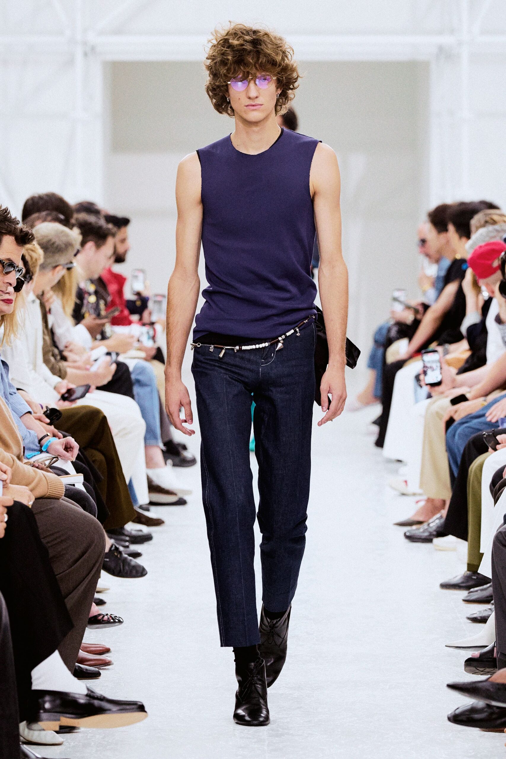 blue tank-top and slim jeans