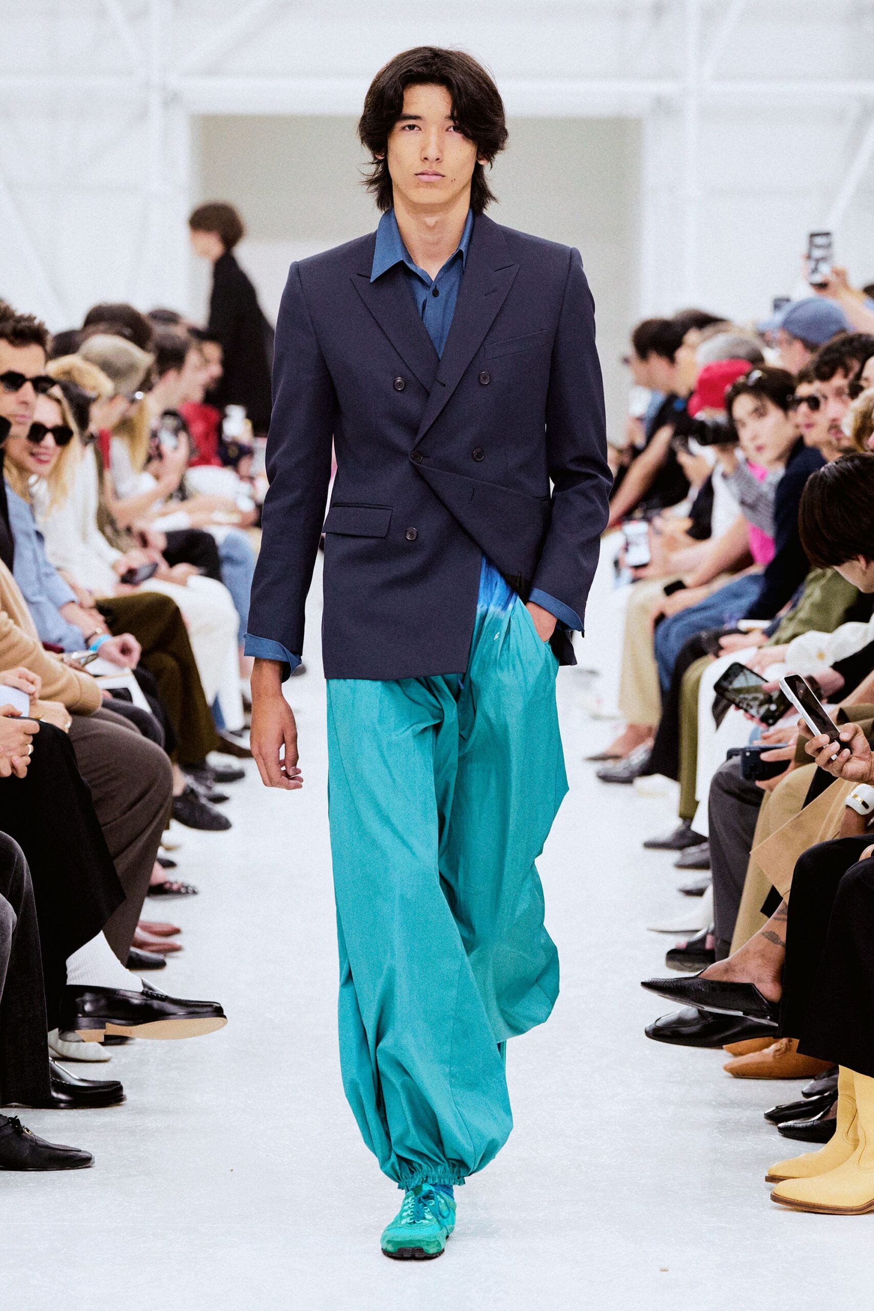 navy blazer with teal pants