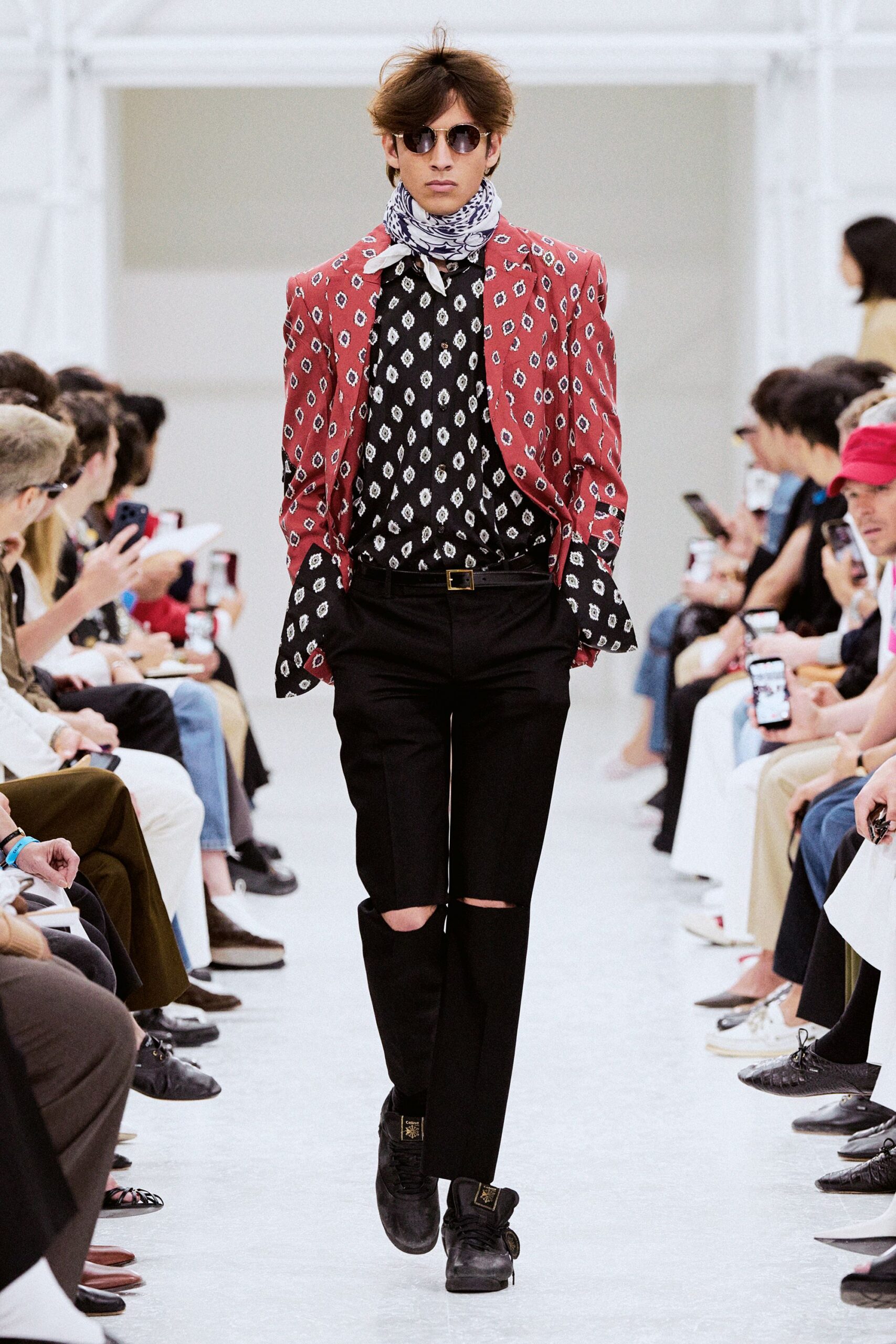 red printed jacket with black shirt