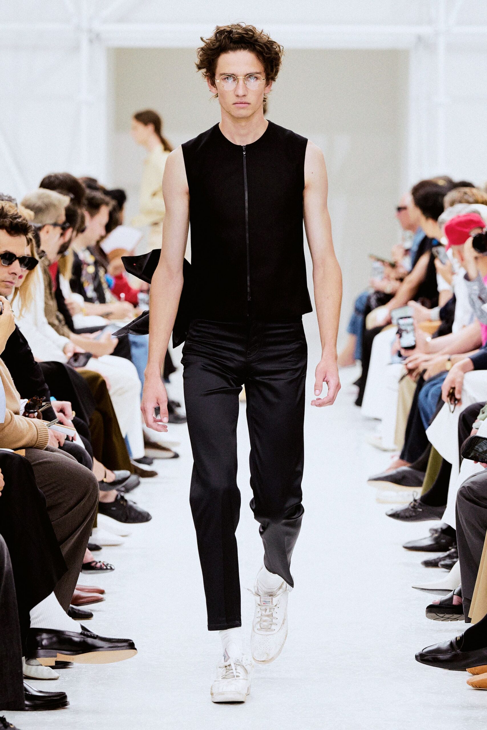 black fitted sleeveless top and pants
