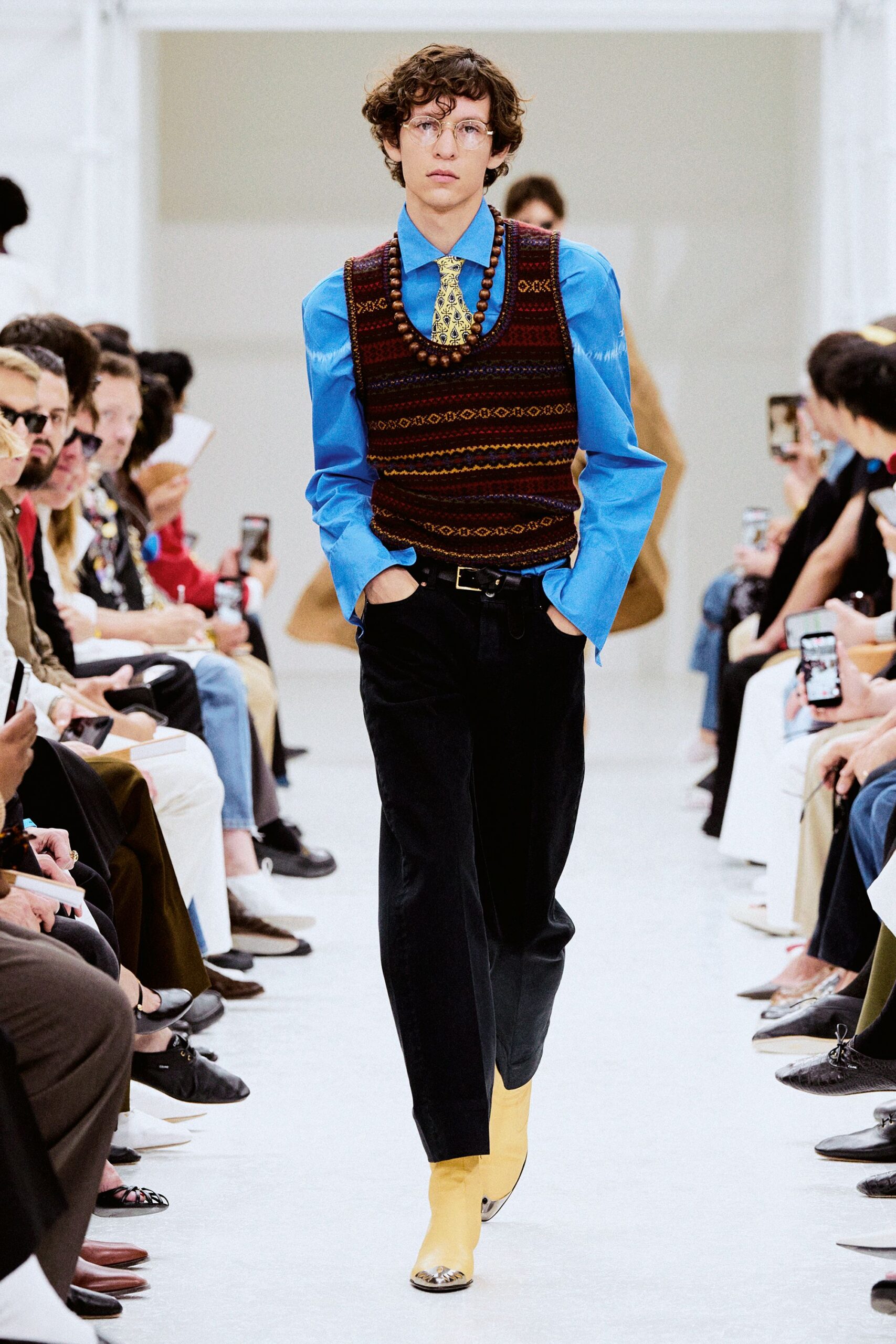 brown embroidered wool vest with blue shirt