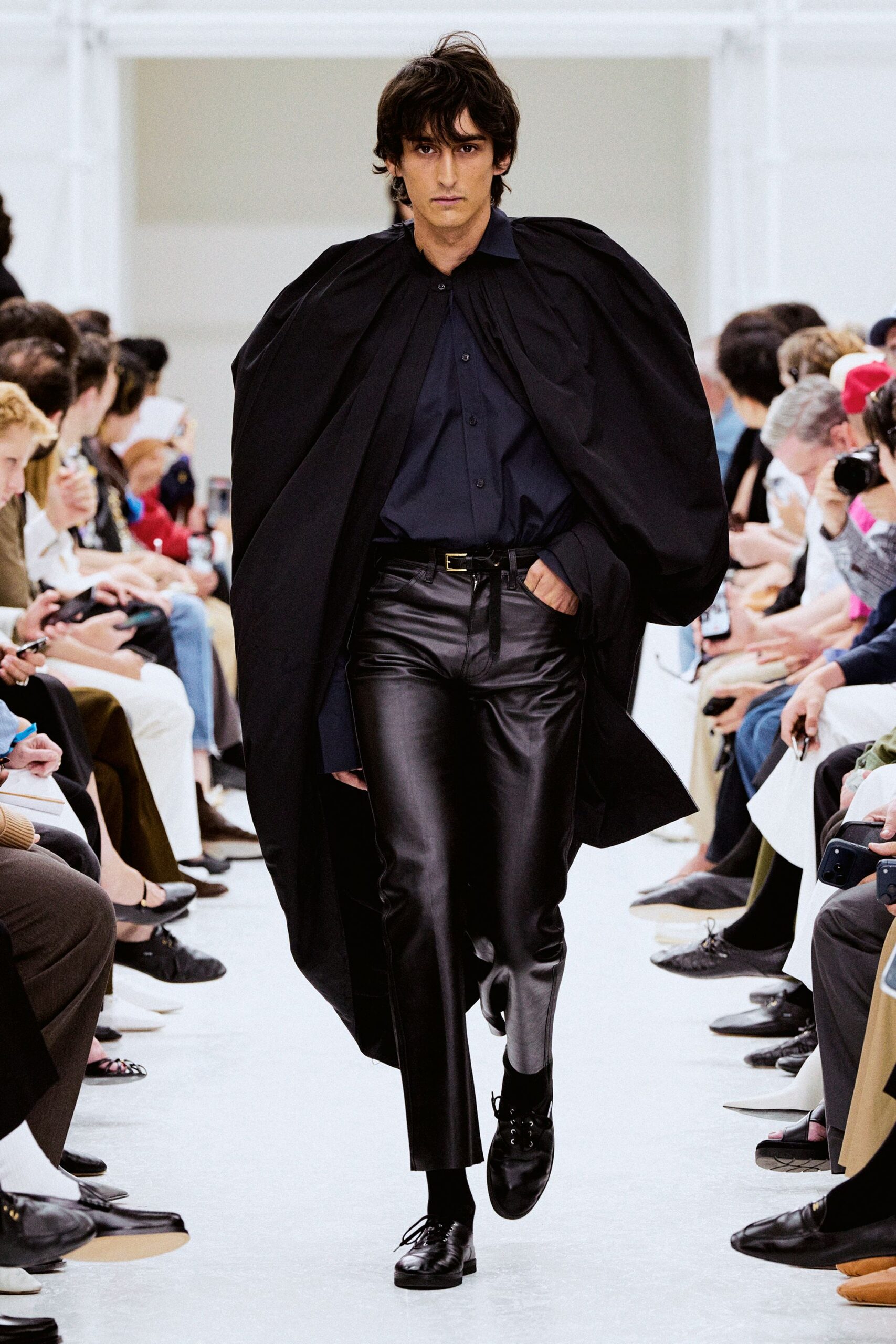 black leather pants with cape