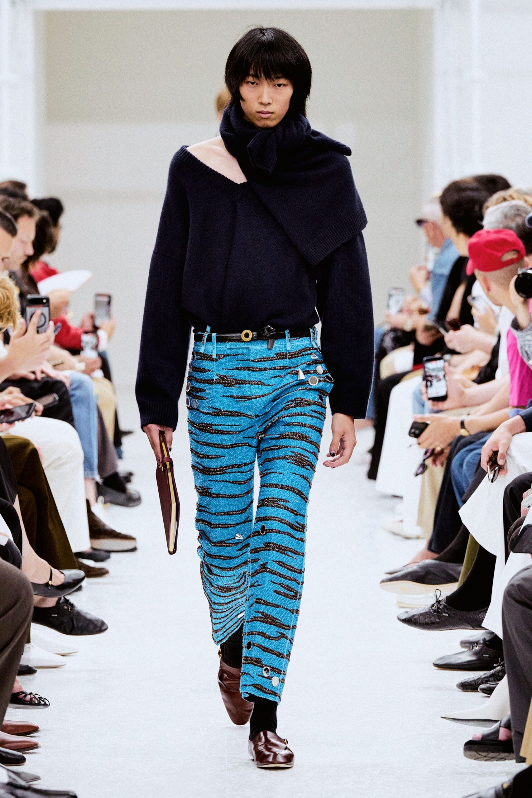 black oversized sweater blue printed pants