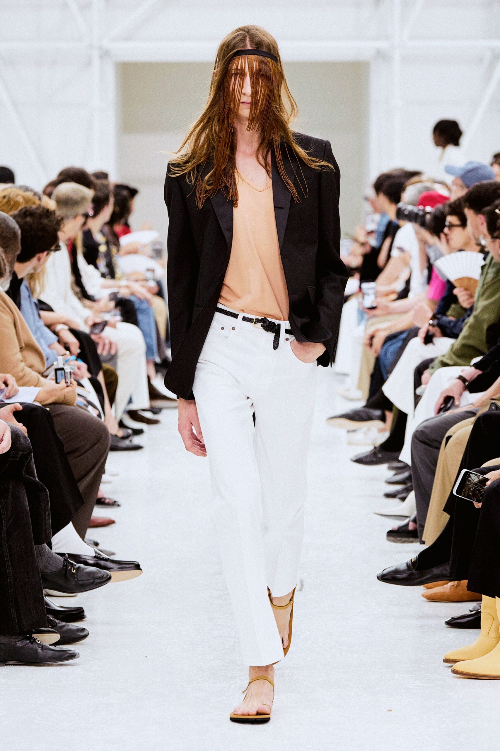 black blazer beige top white pants