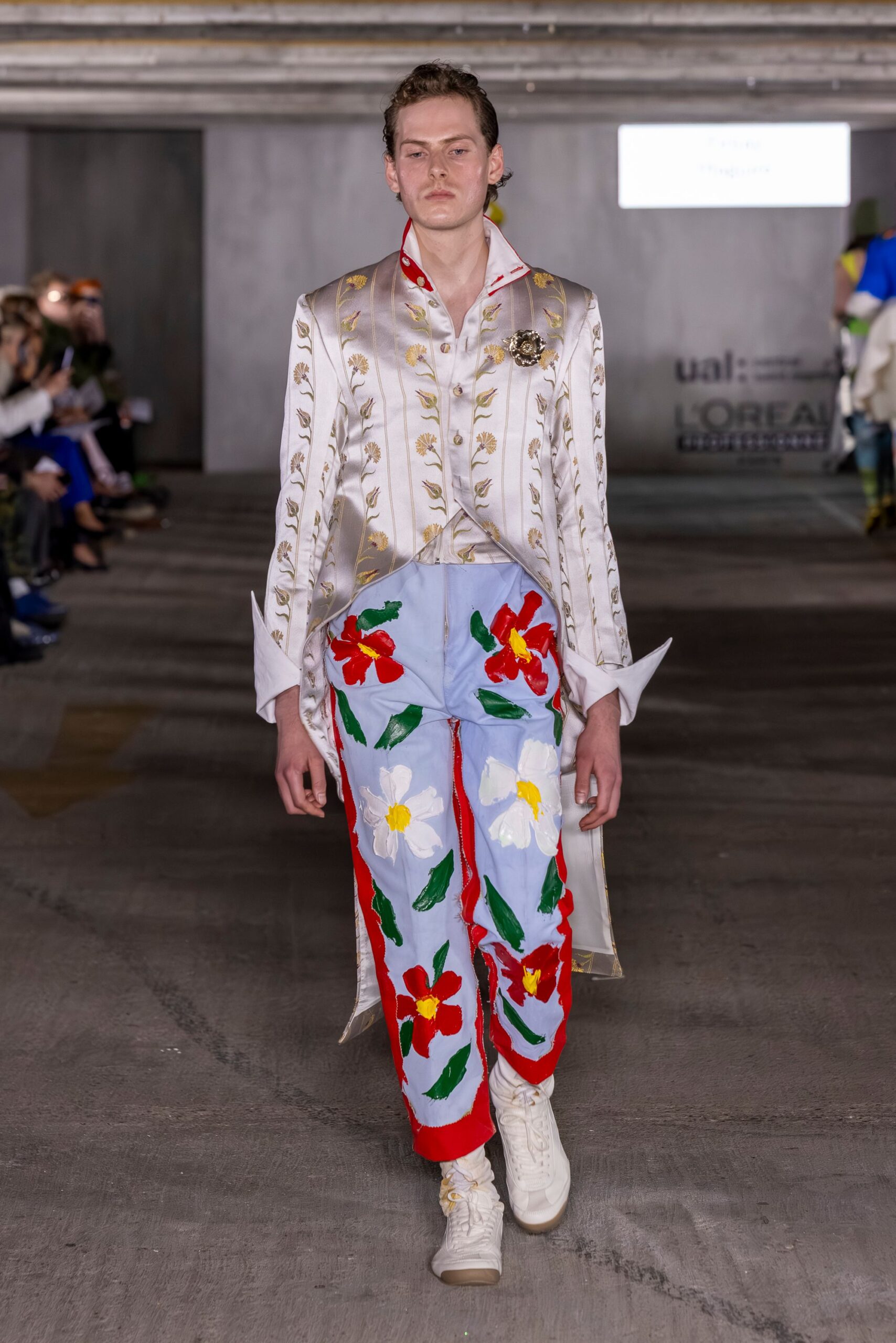embroidered pants with white shirt and coat