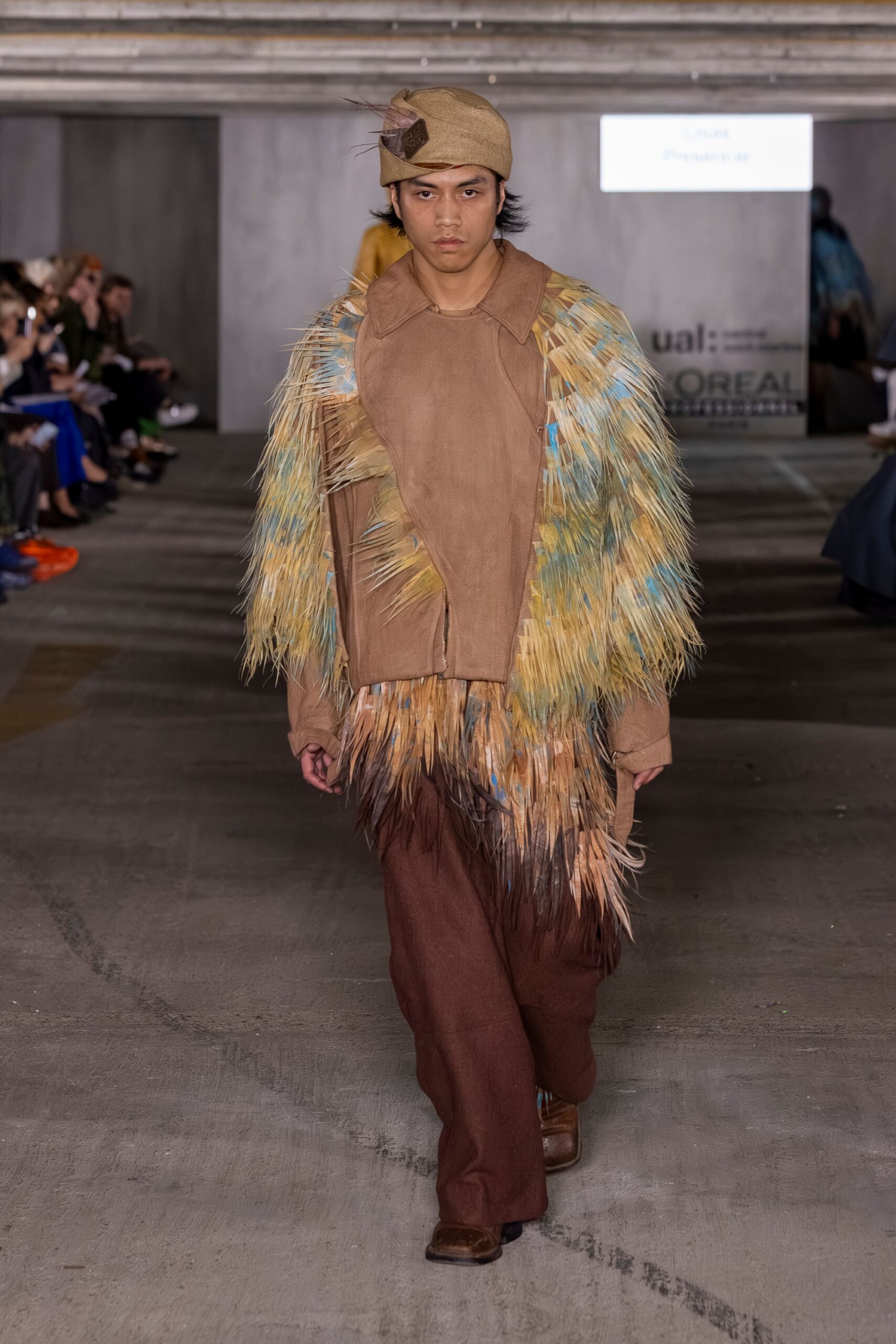 fringed leather jacket with wide-leg pants