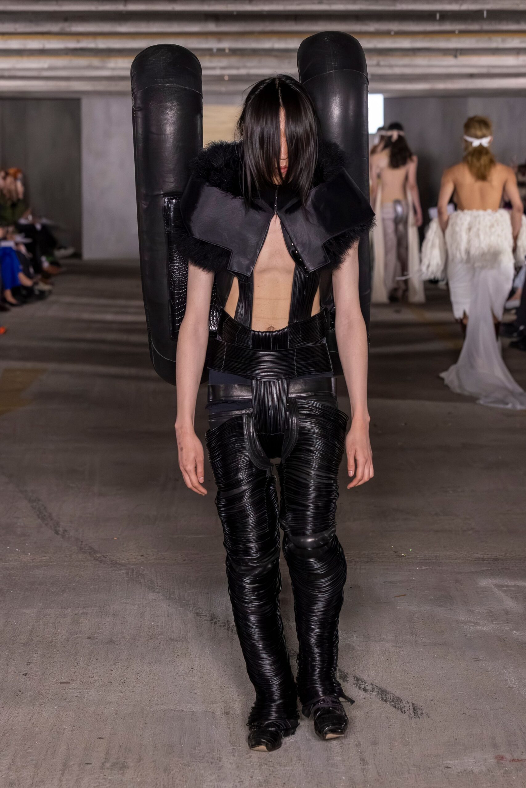 black leather sleeveless v-neck fitted structured top